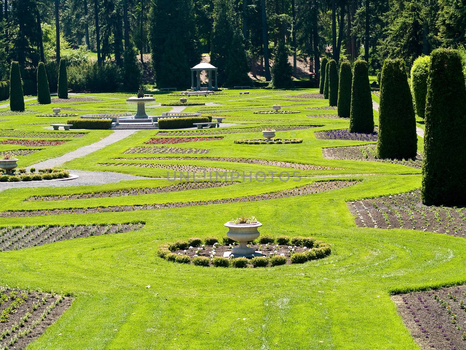 A Well Groomed Park in Early Spring with a Paved Path