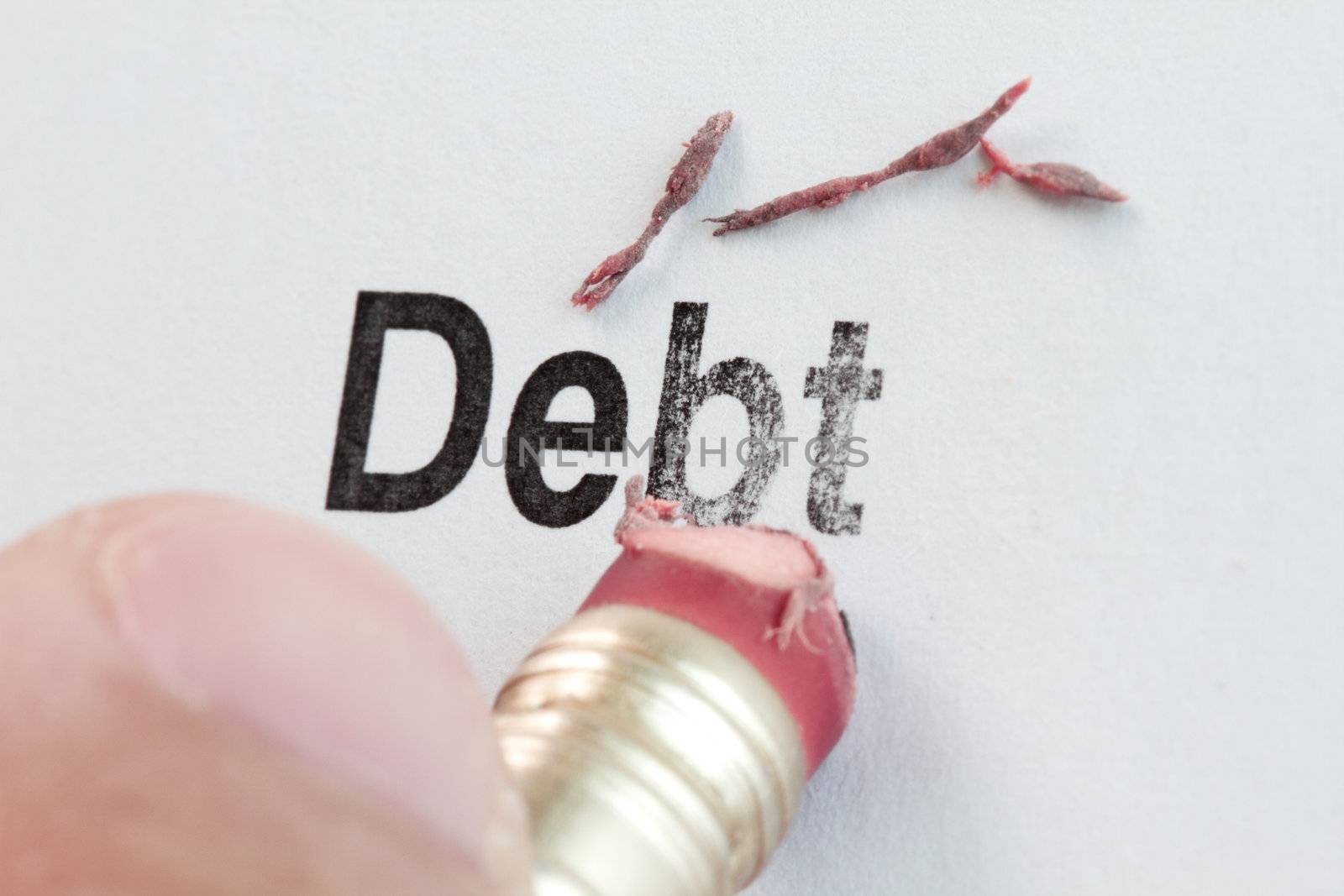 eraser and word debt, concept of Reduce Debt 
