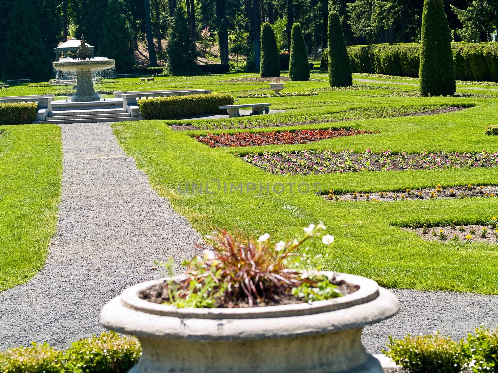 A Well Groomed Park in Early Spring with a Paved Path