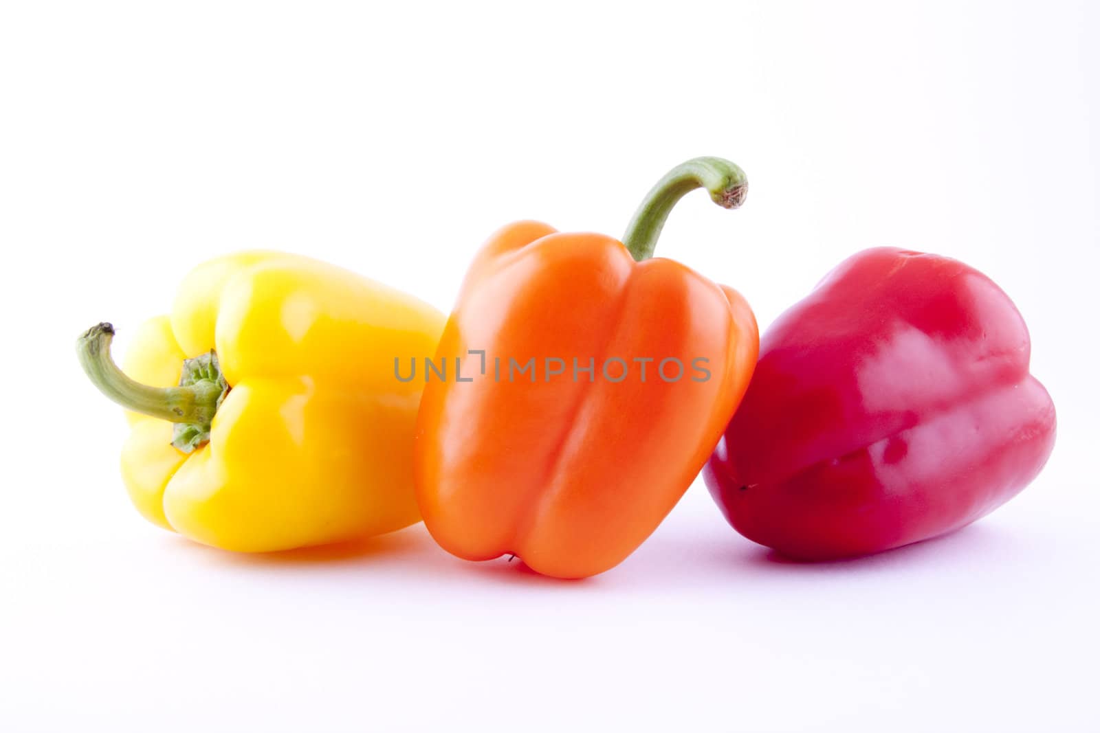 three bell peppers isolated by shutswis