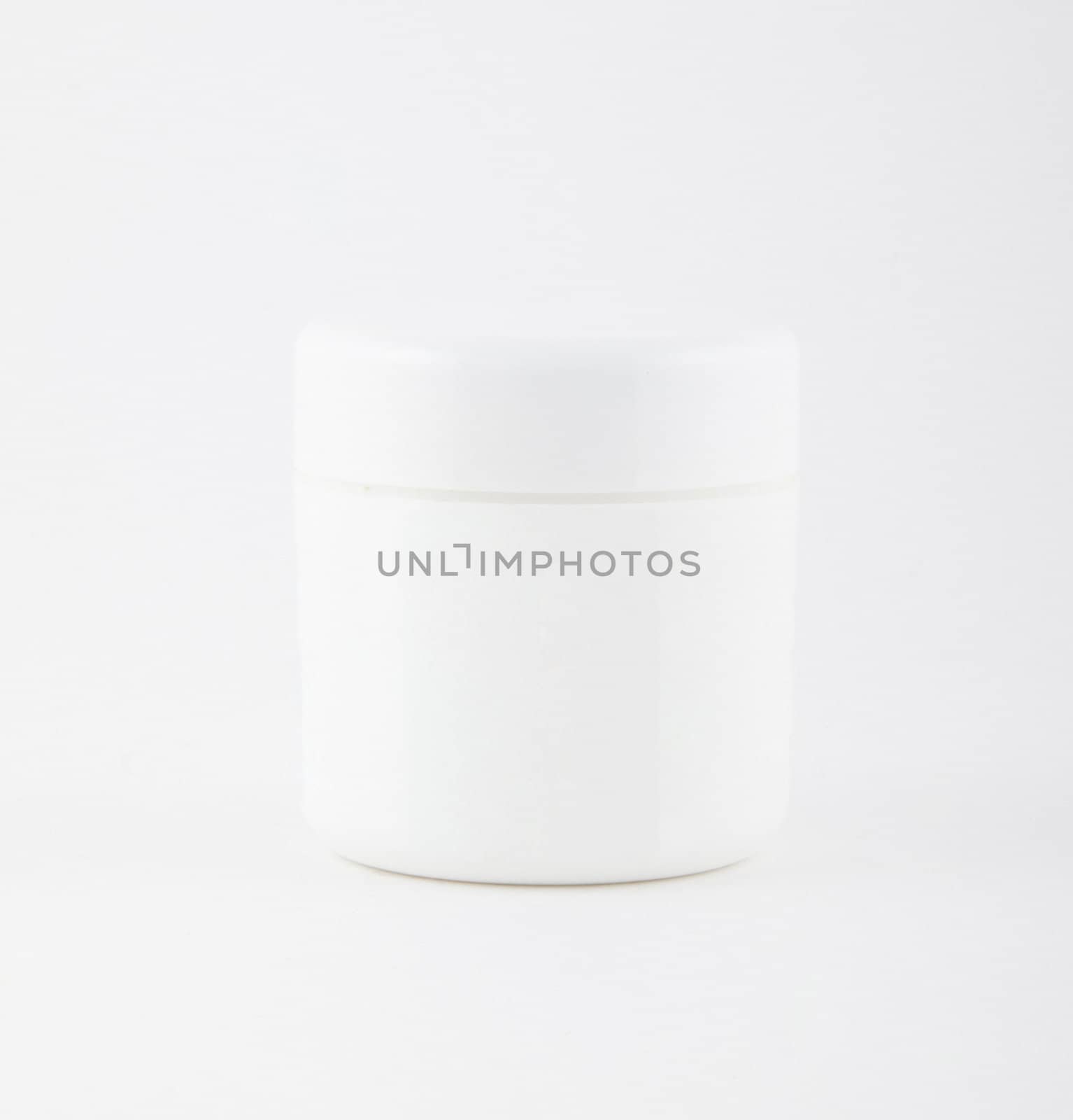 cosmetic container on white background