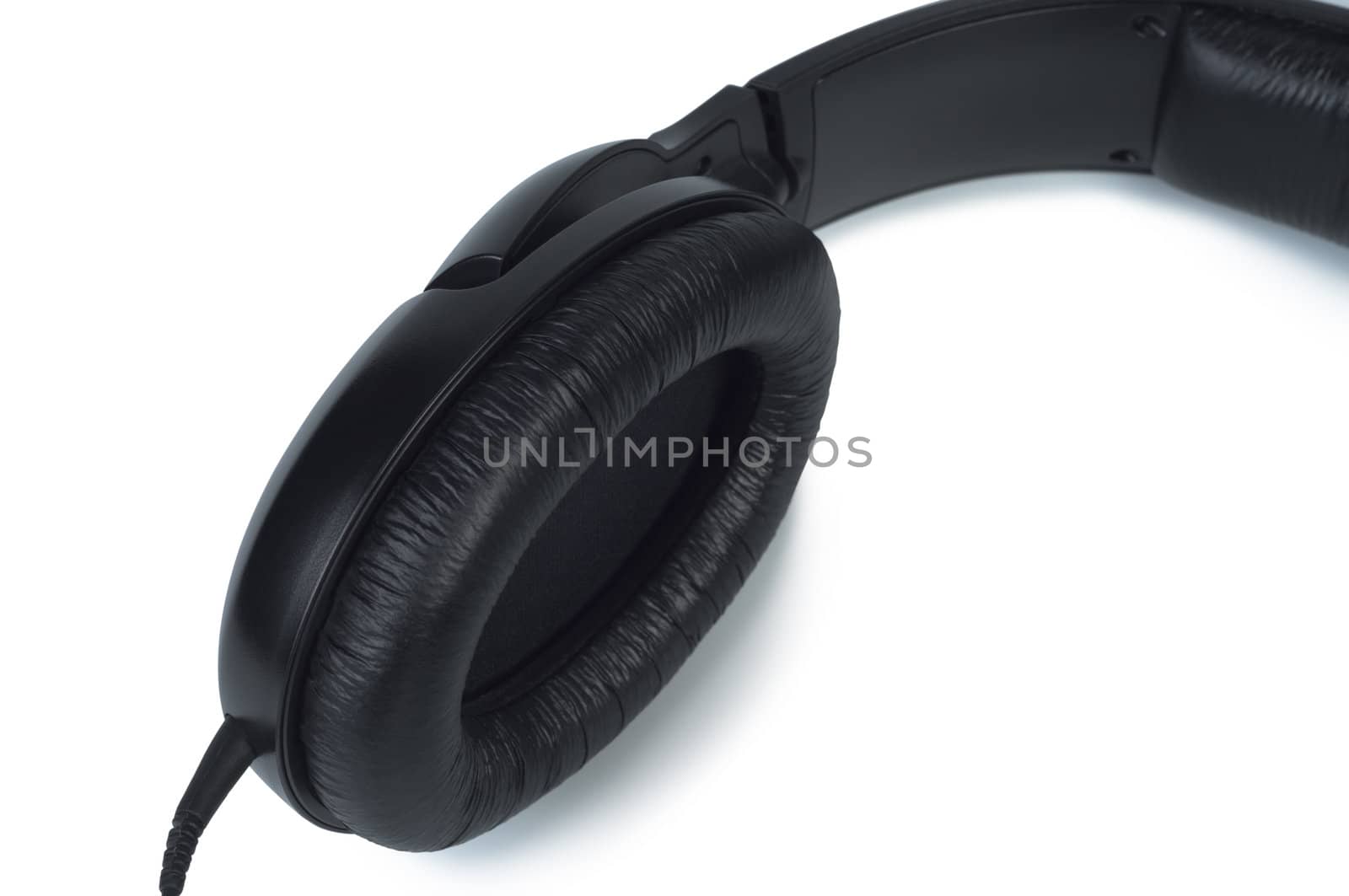 Part headphones with leather embouchure close-up on white background.