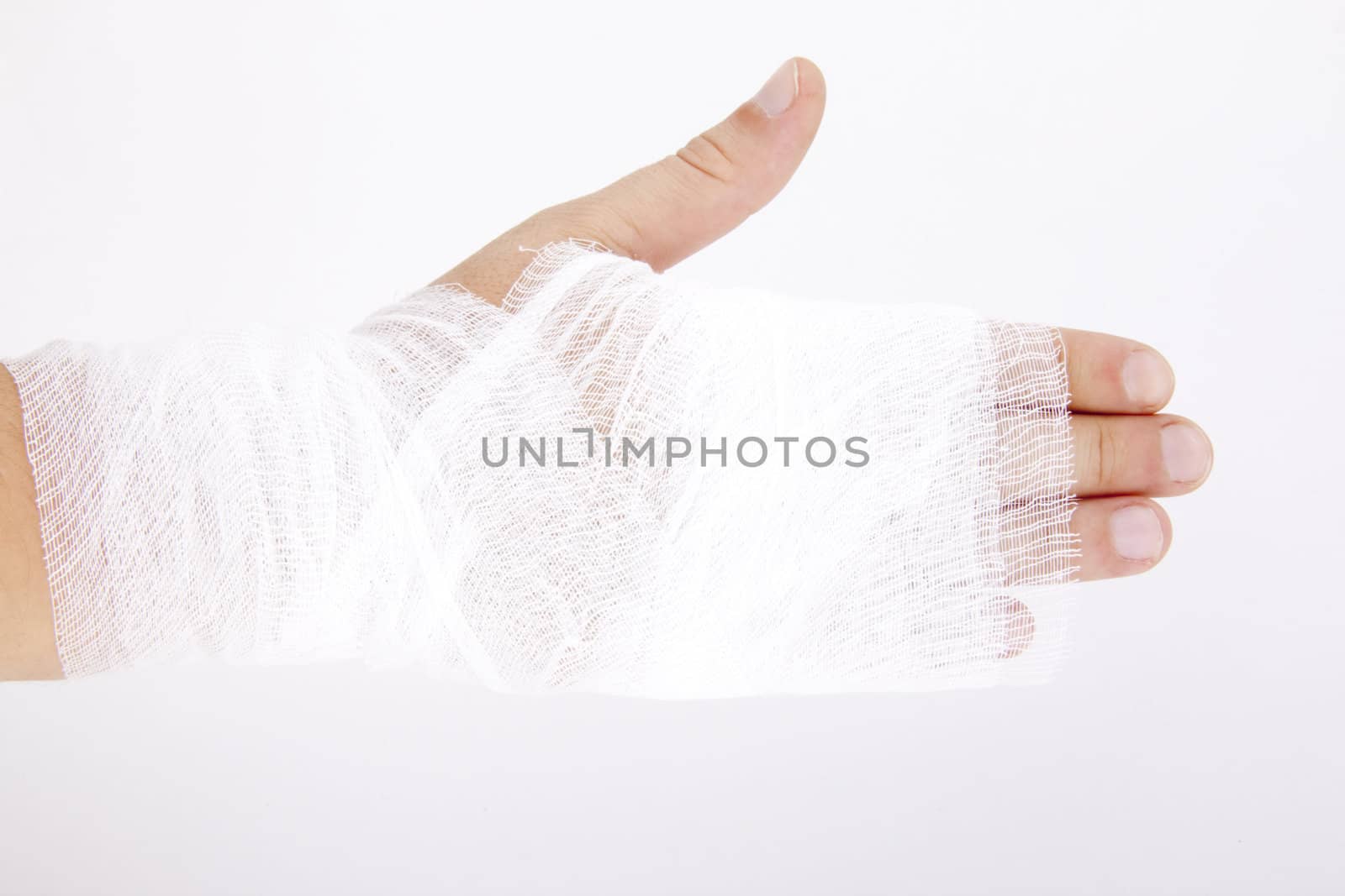 bandaged hand on white background