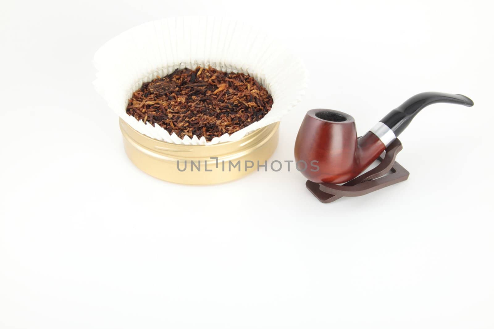 pipe and tobacco isolated on white