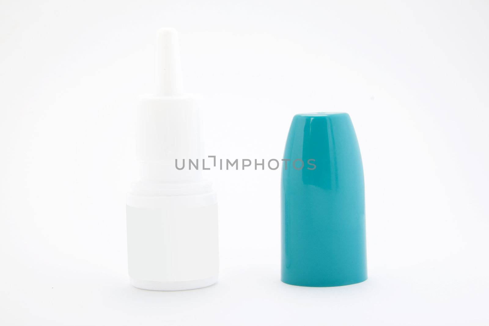 Bottle of nose drops isolated on white