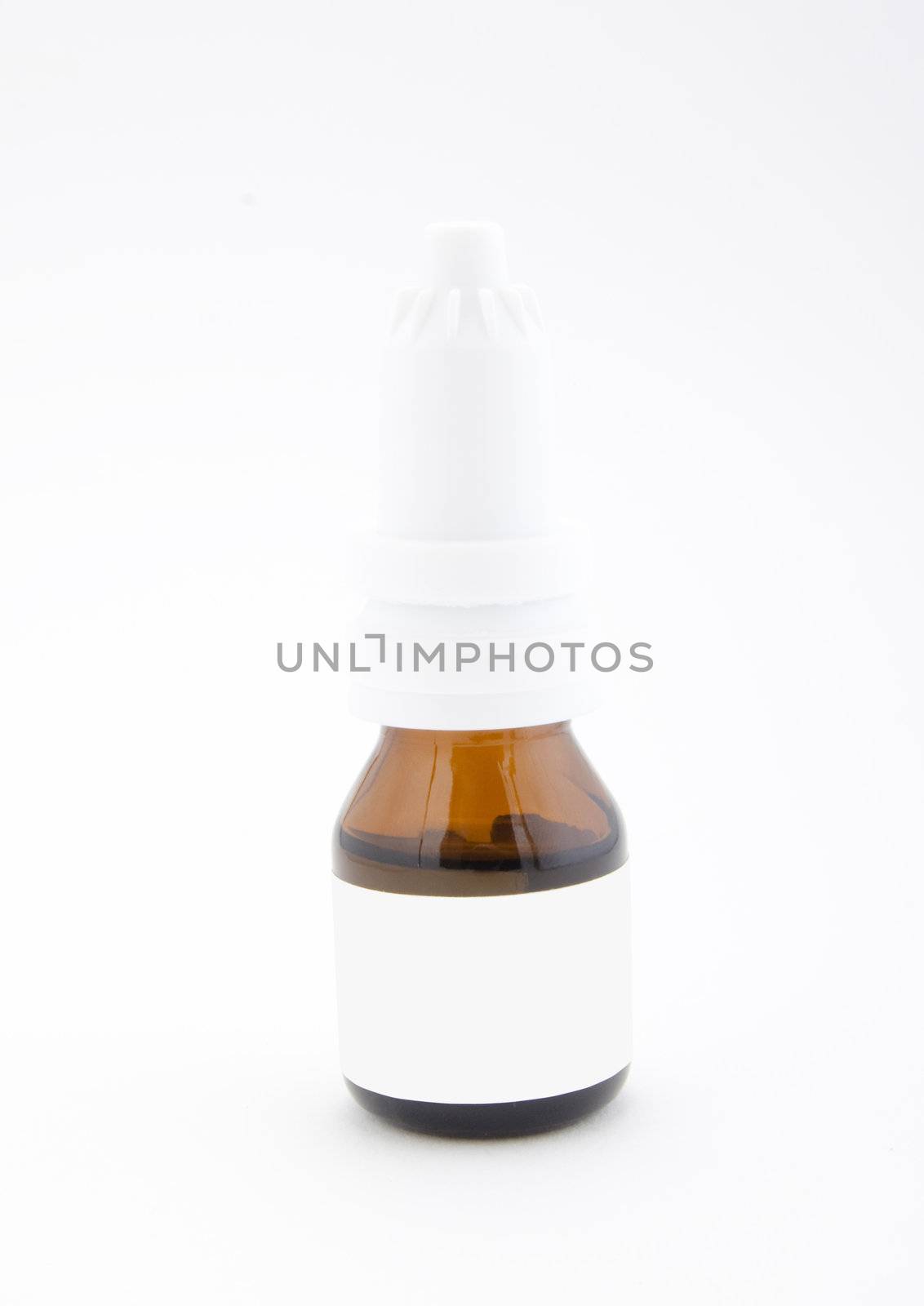 Bottle of nose drops isolated on white