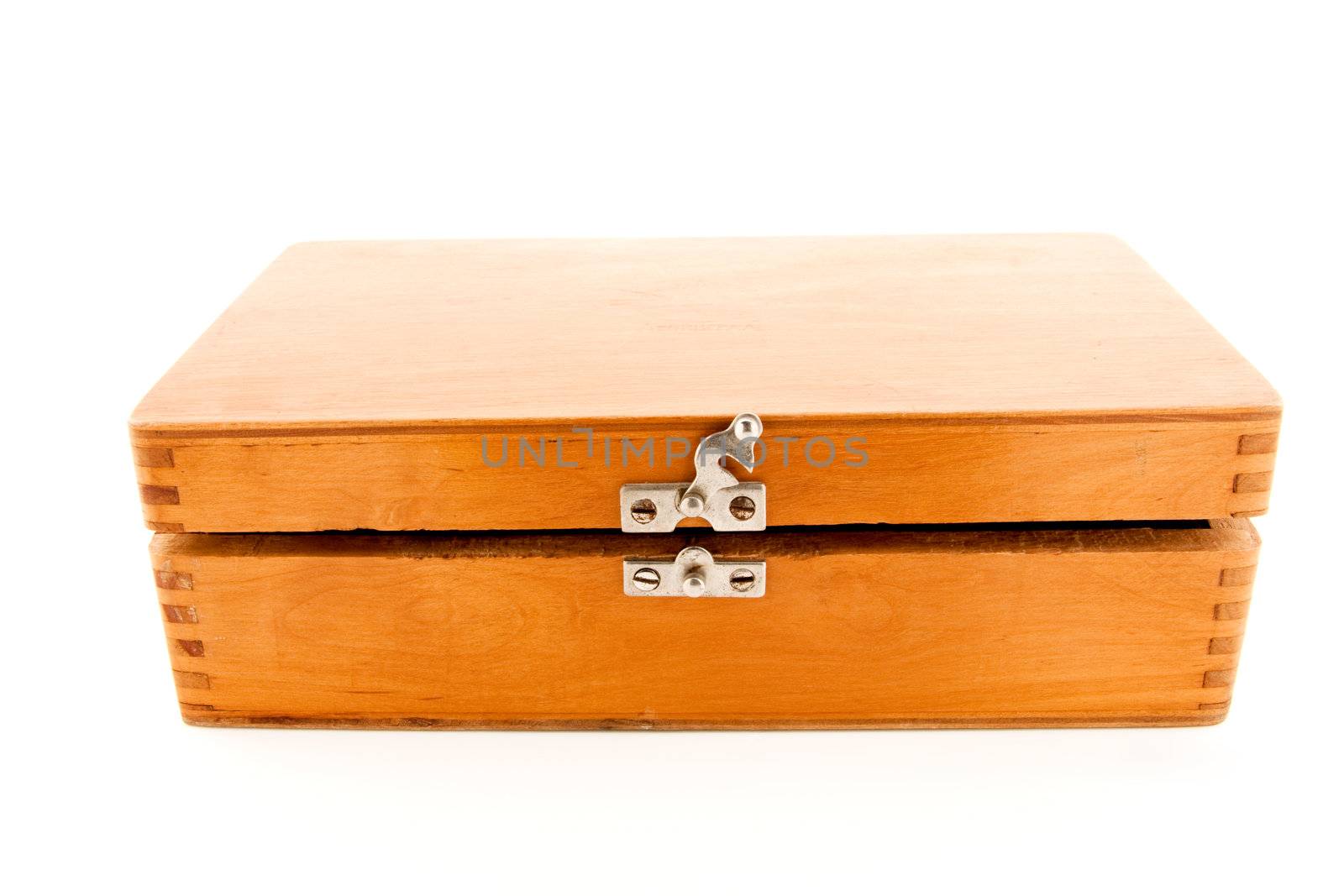 Opened vintage wooden chest on white background