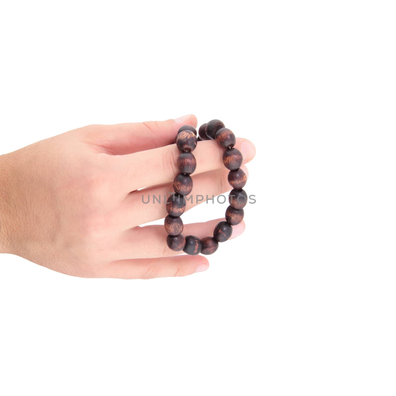 Rosary in hands isolated on white background