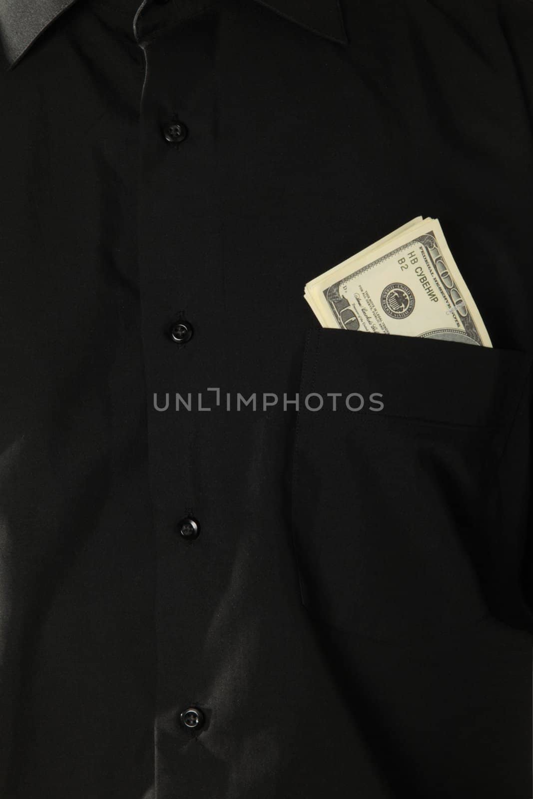 Dollars in pocket of coat by shutswis