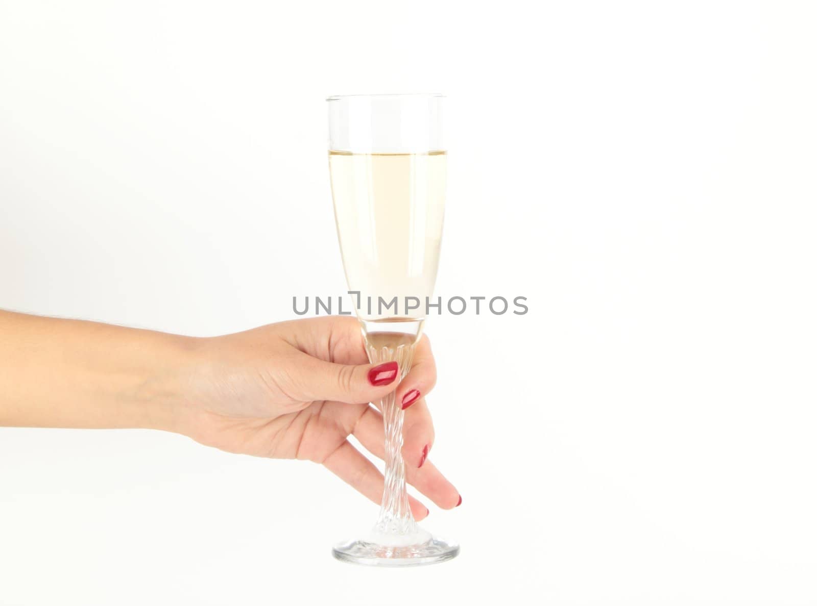 women Hand holding glass of champagne on white background