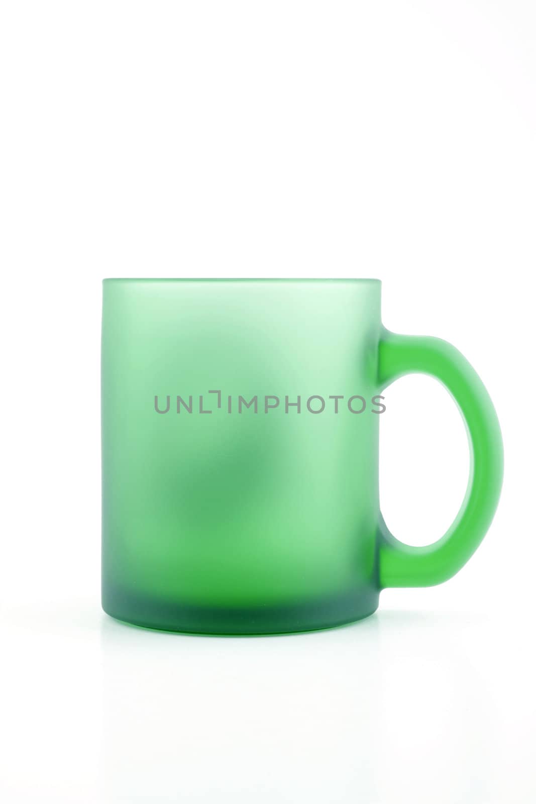 Green mat glass cup isolated on white