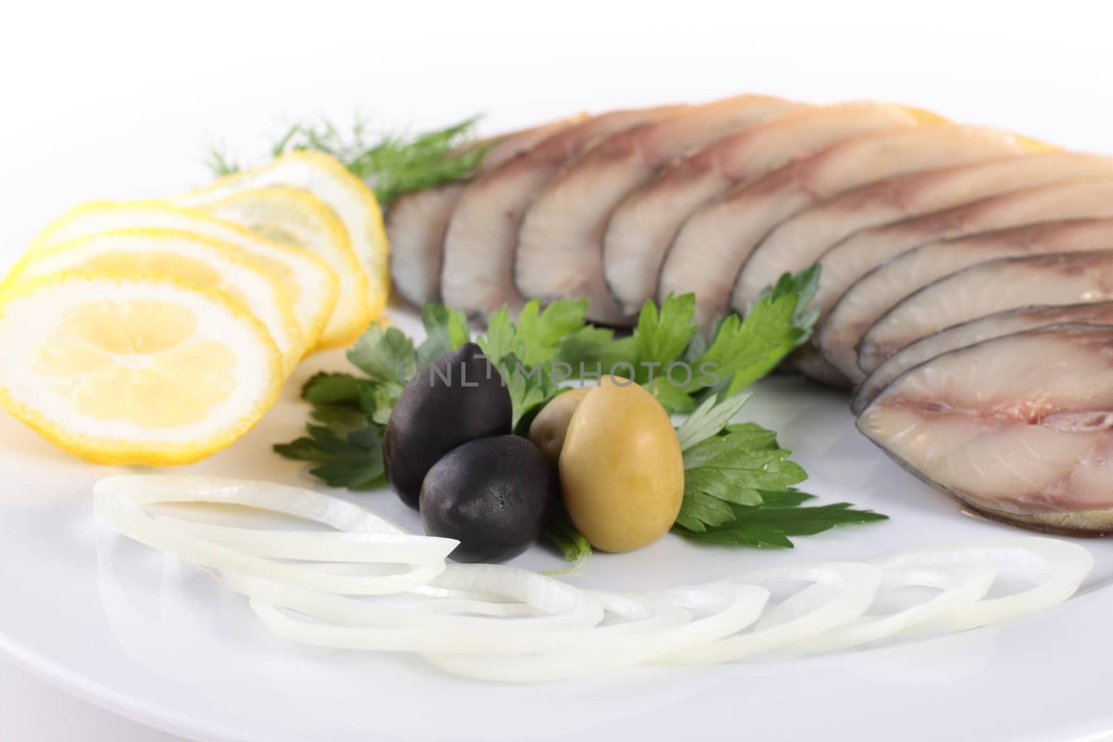 fish with vegetables,anion olives isolated on white