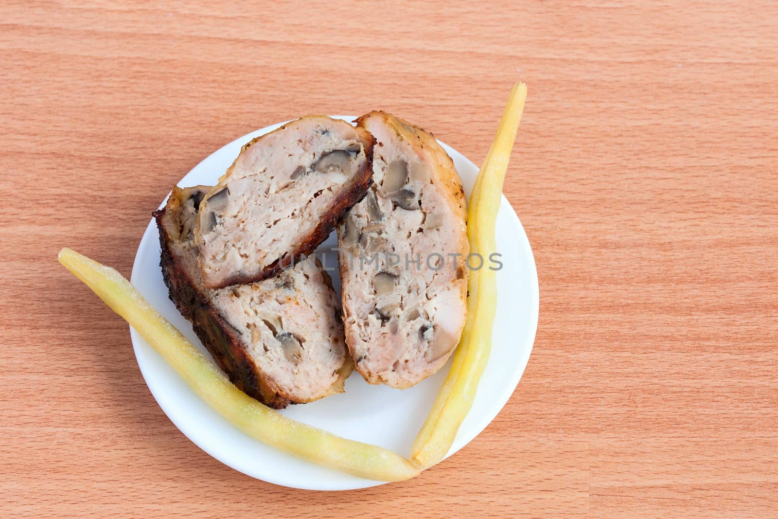 Grilled barbecue chicken quarters on a cutting board