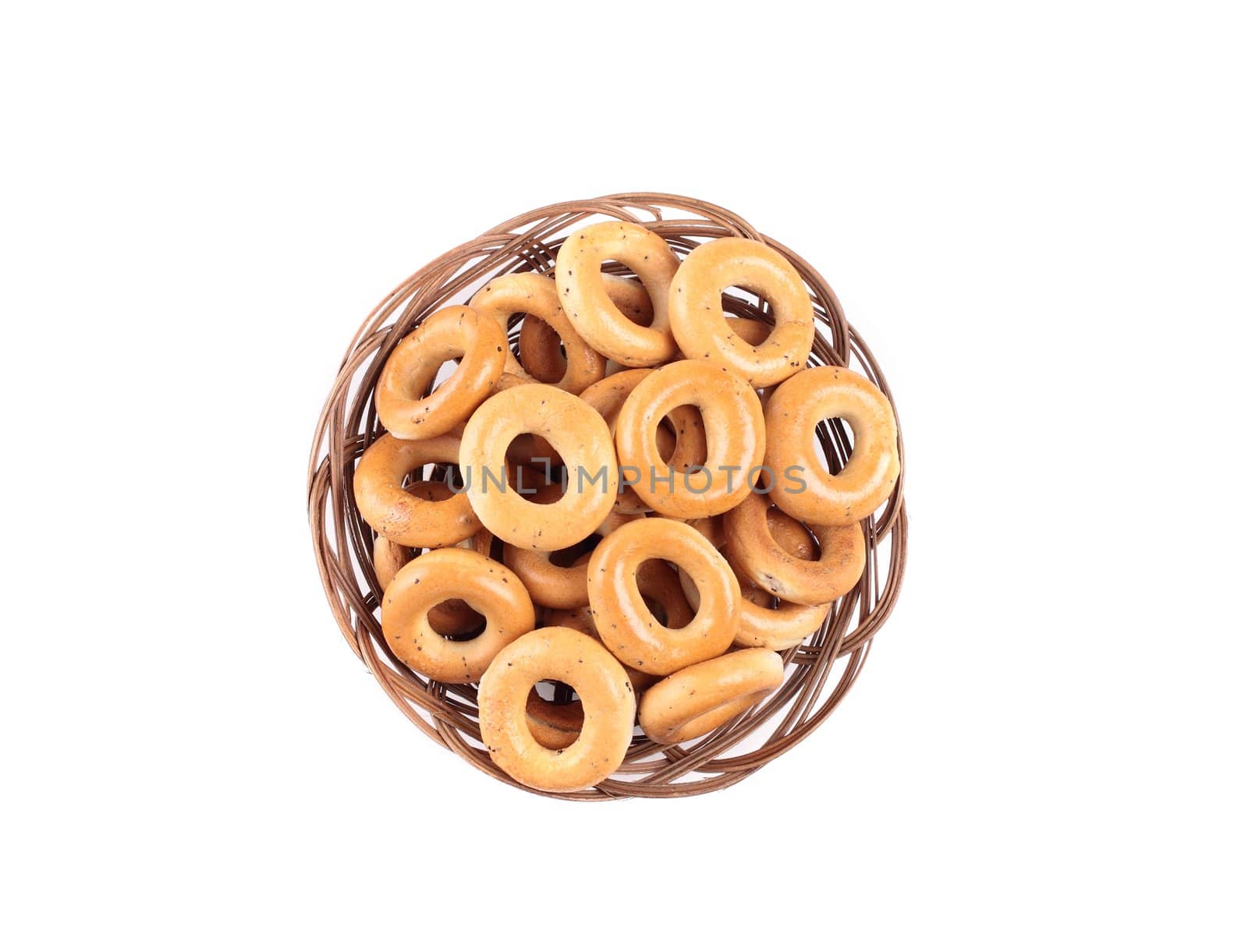 small bagels in basket isolated on white