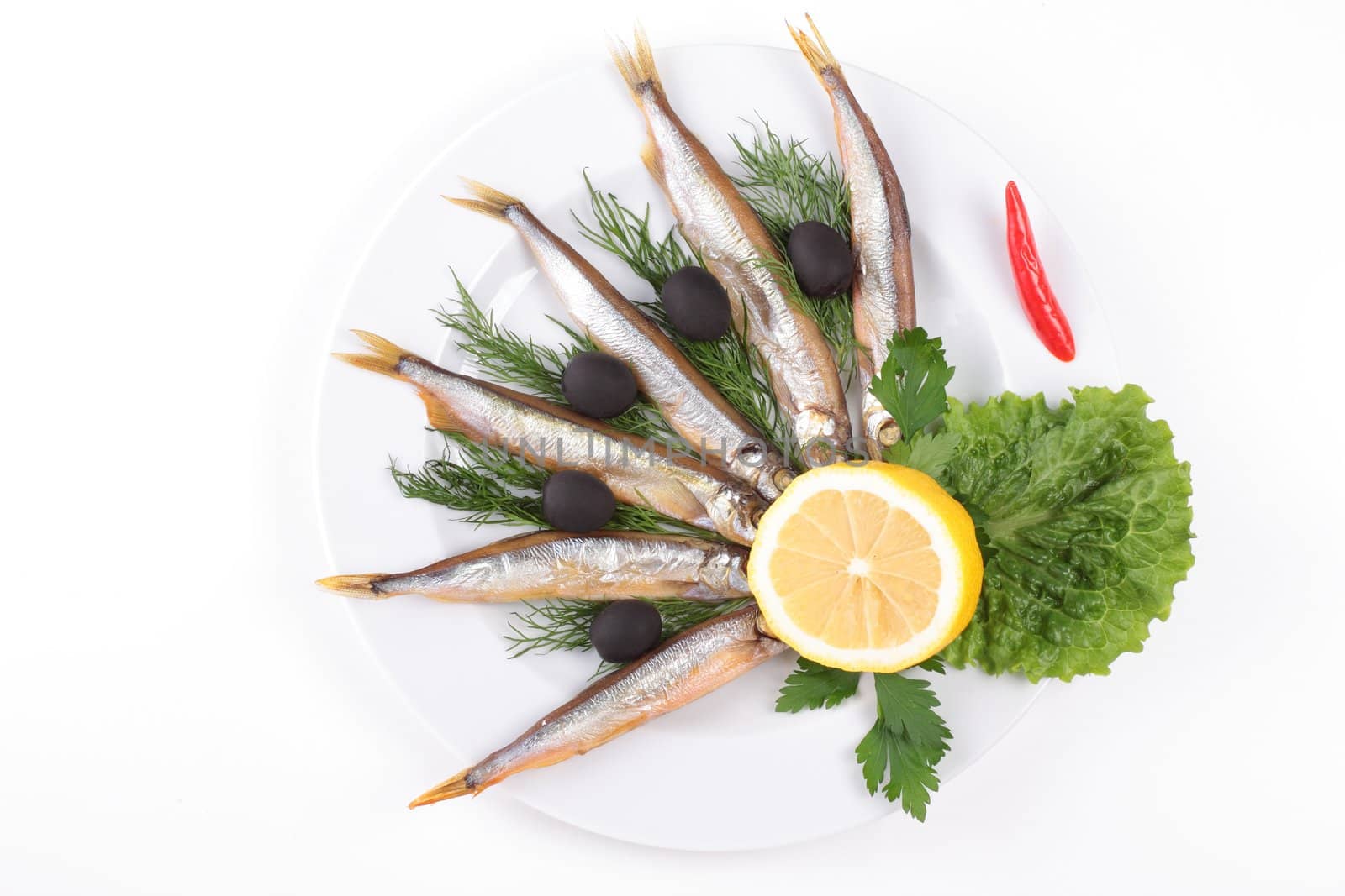 anchovies with vegetables isolated on white background
