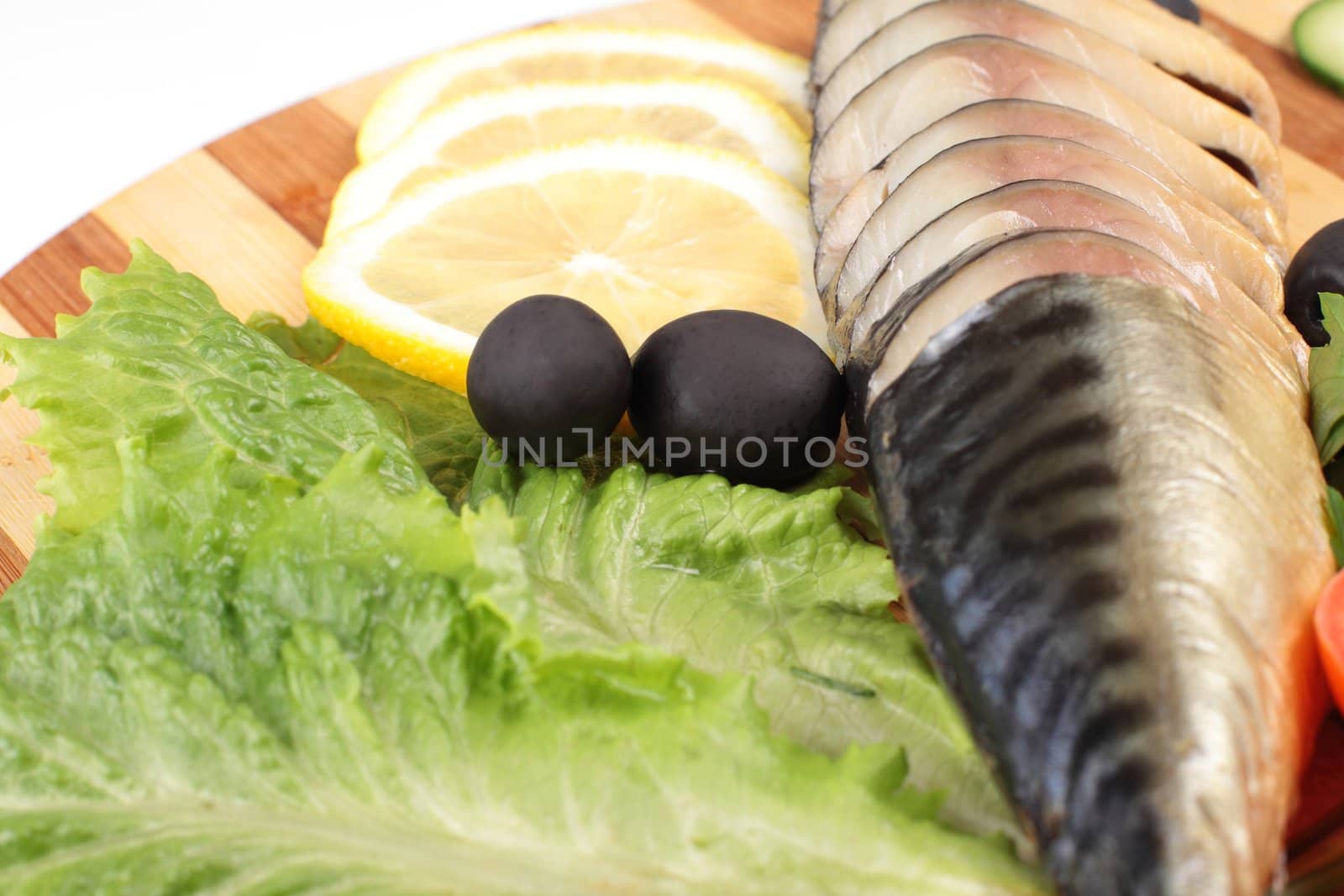 herring fillets with herbs and salad isolated on white