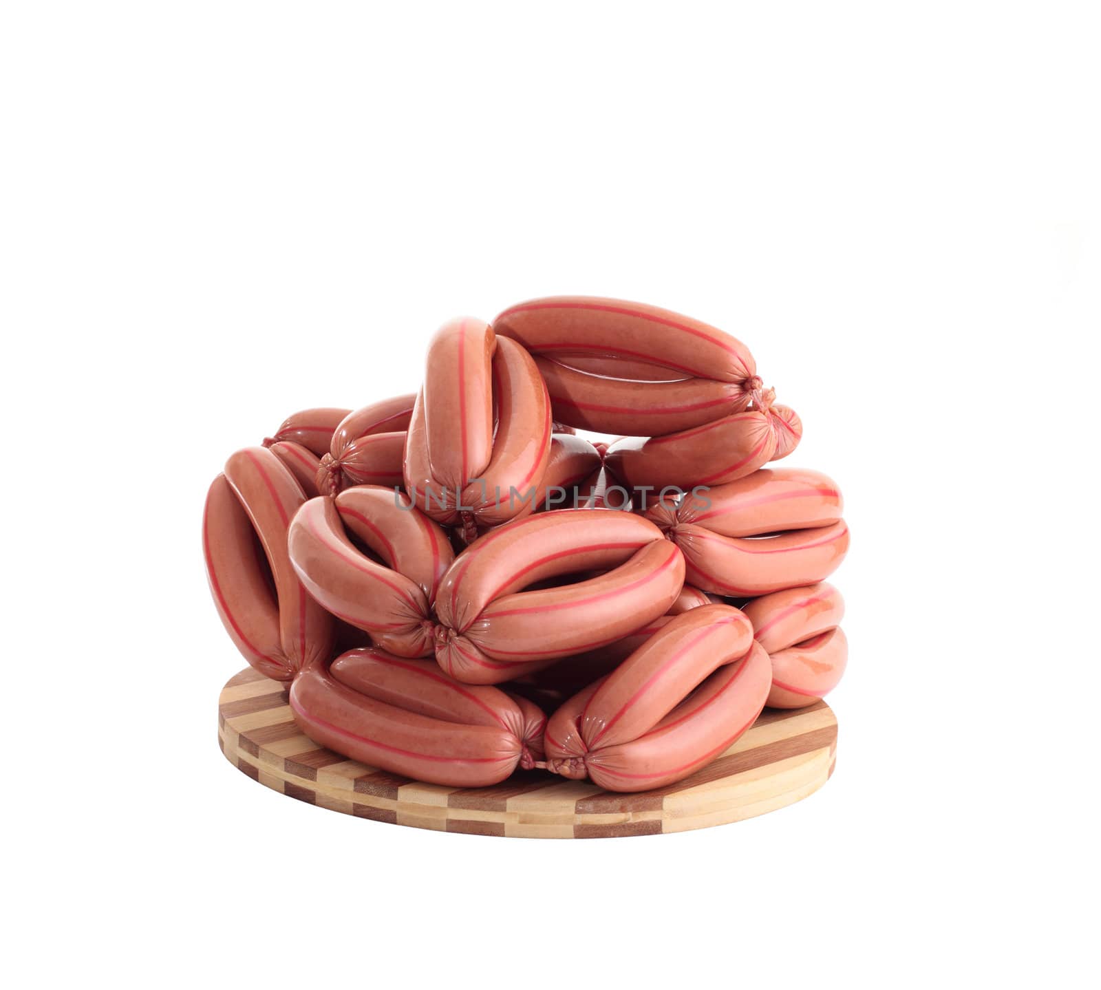 sausages on wooden plate isolated on white