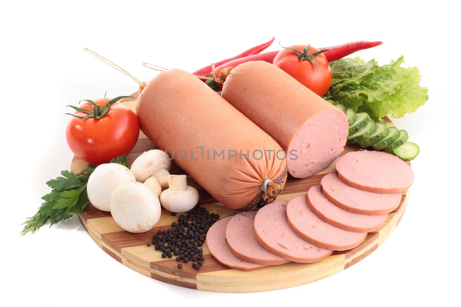 sausage on plate with vegetables by shutswis