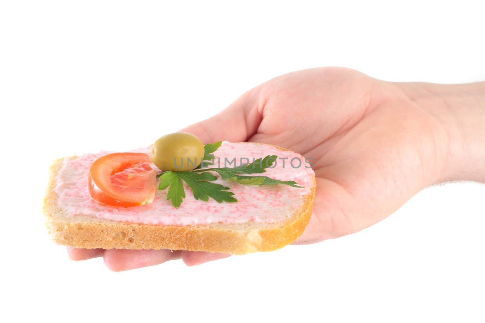 hand holding toast with fish caviar cream isolated