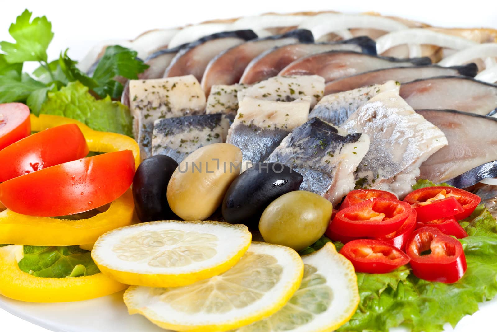 close up sliced fish with vegetables isolated