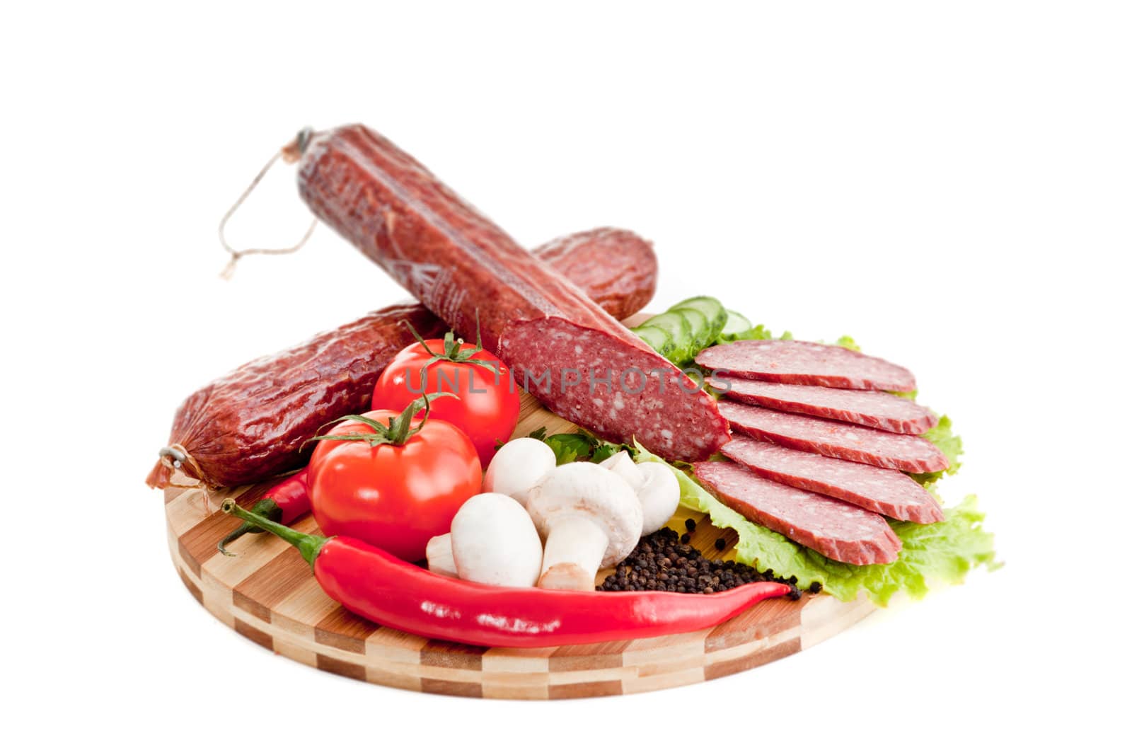 sliced sausage with vegetables and red papper for site