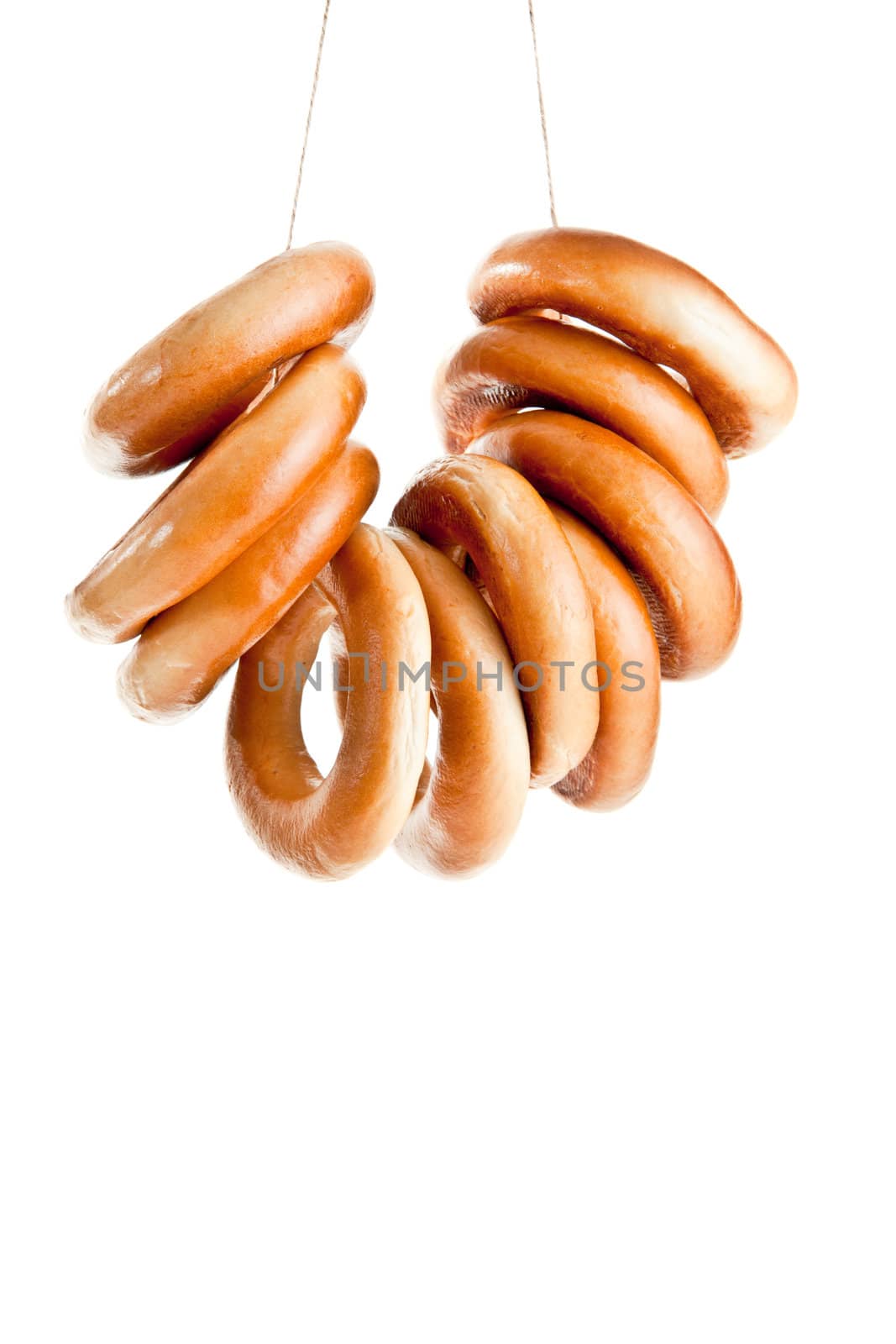 bagels in thread isolated on white background