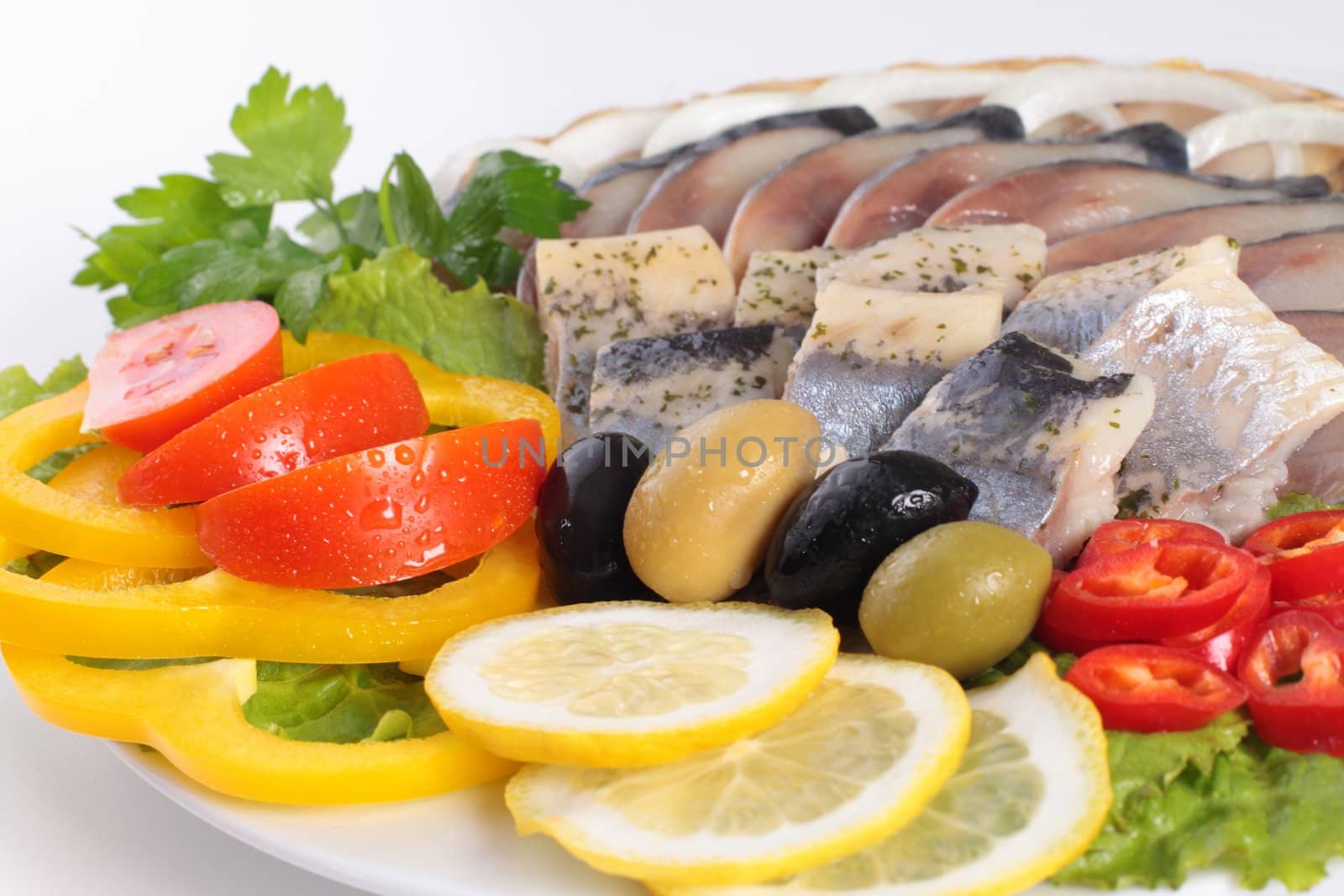 fish with vegetables,anion red pepper close up