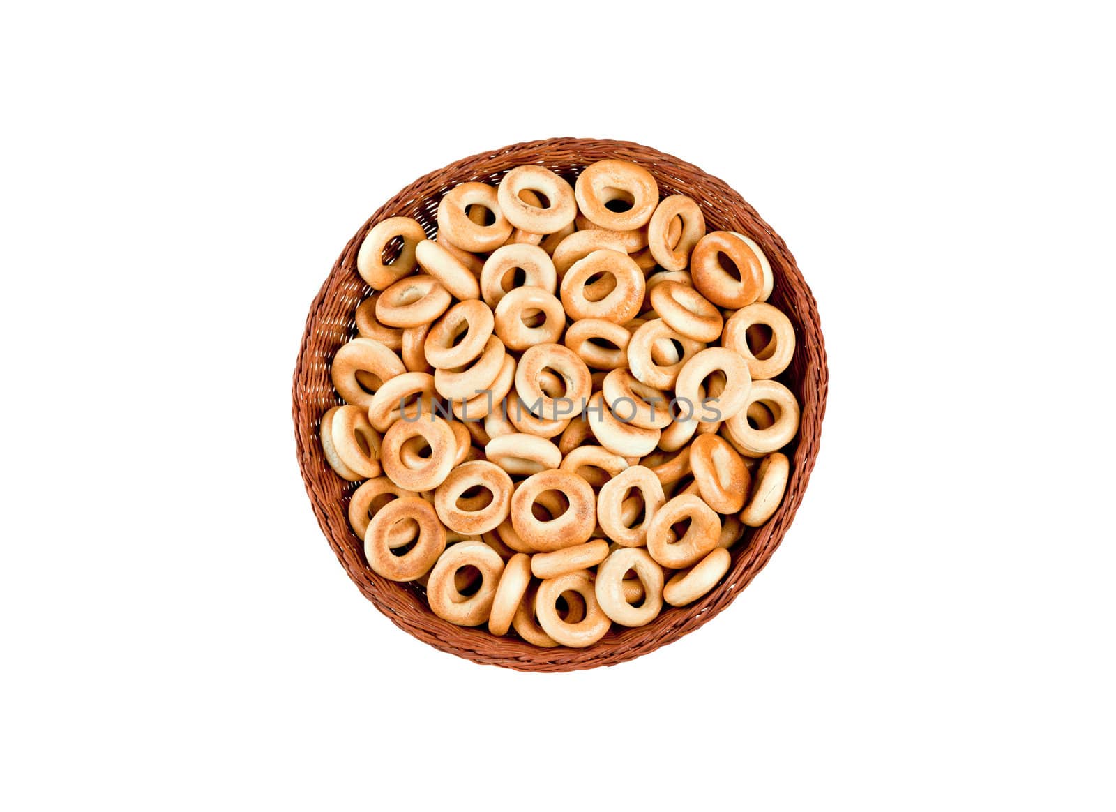 small bagels in basket isolated on white