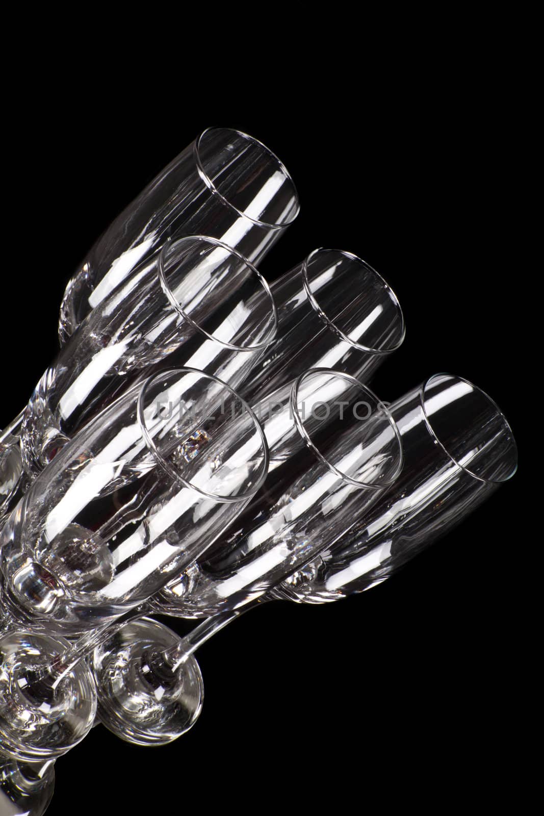 empty glasses of champagne isolated on black