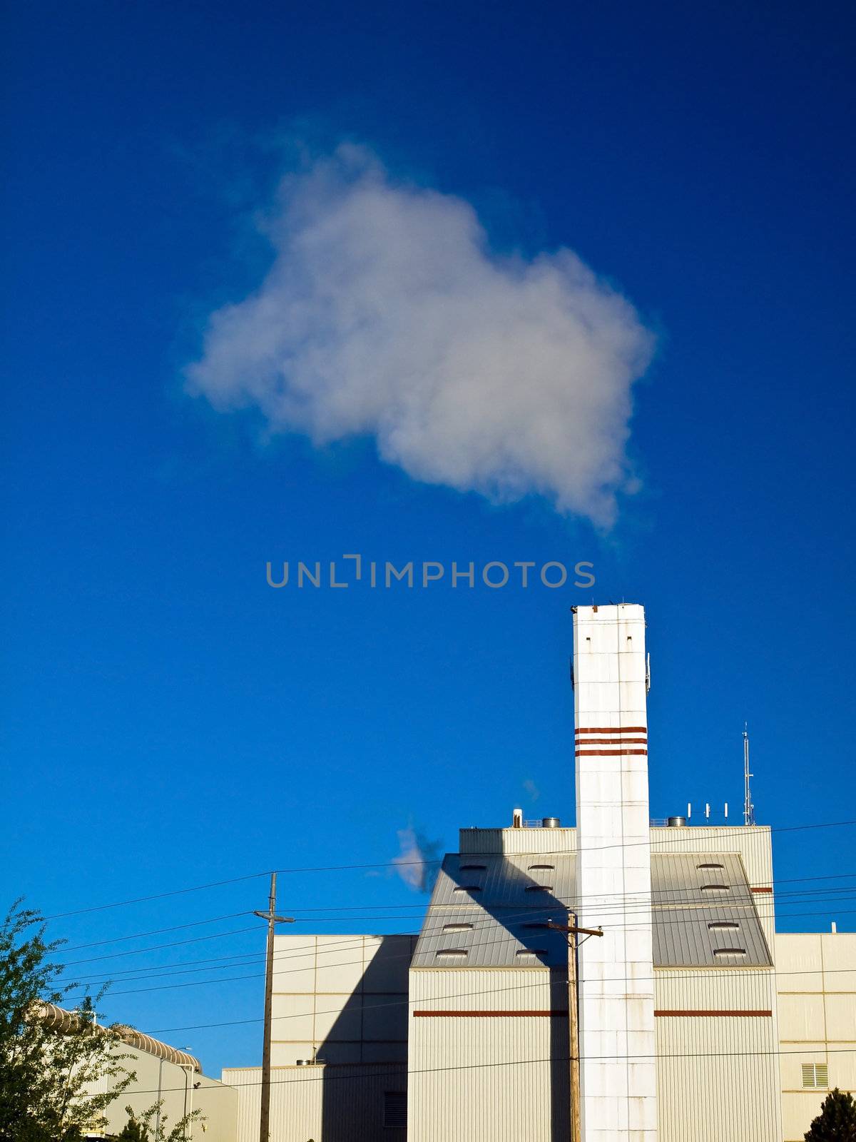 Waste to Energy Plant with Smoke Coming Out of a Smokestack