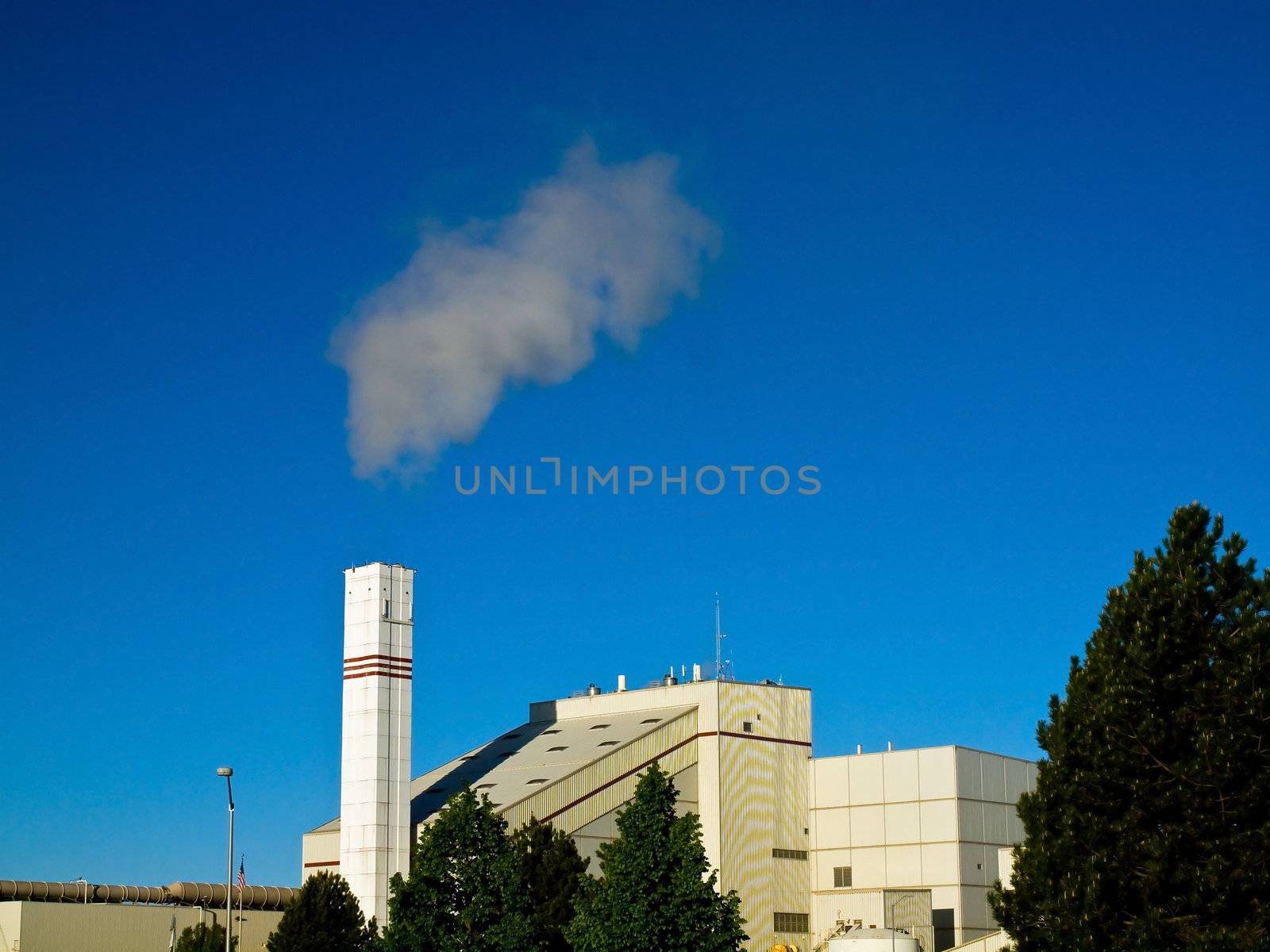 Waste to Energy Plant with Smoke Coming Out of a Smokestack