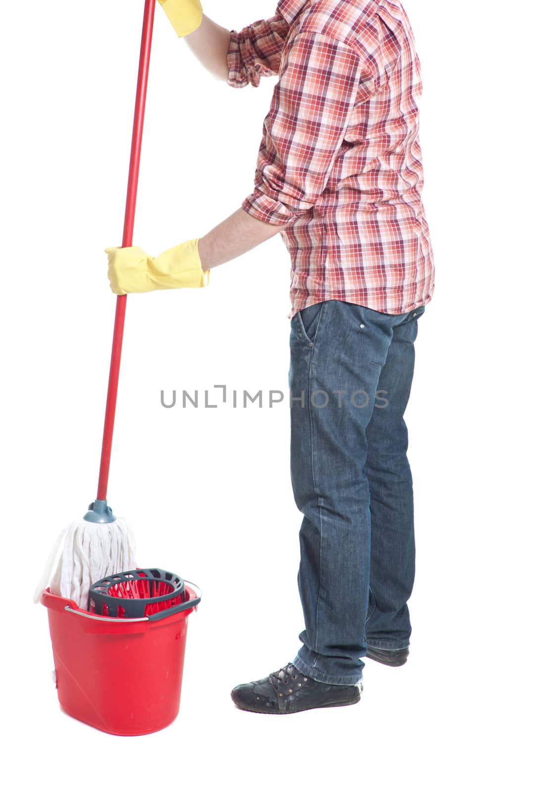 man puts the mop in a bucket isolated