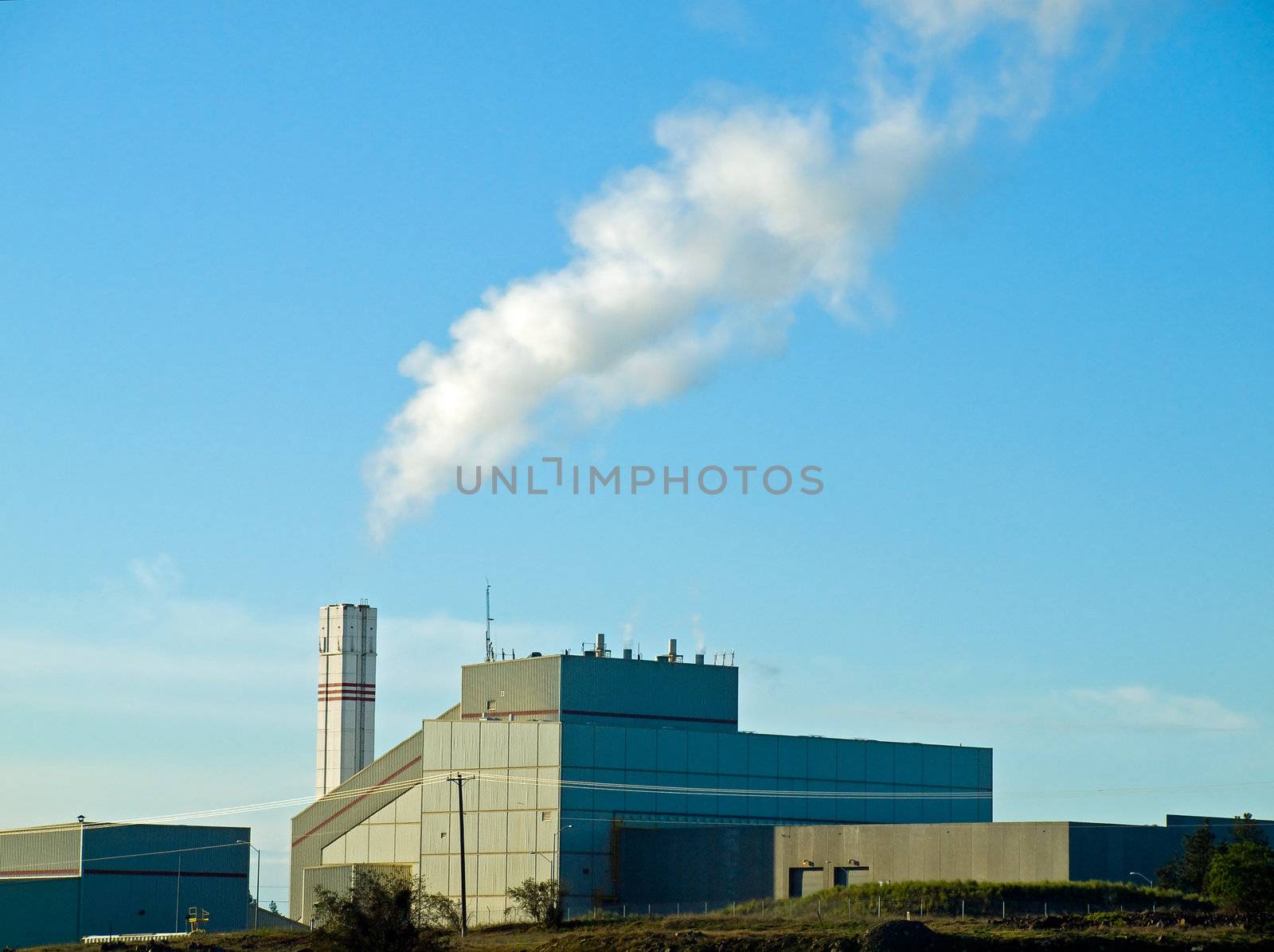 Waste to Energy Plant with Smoke Coming Out of a Smokestack