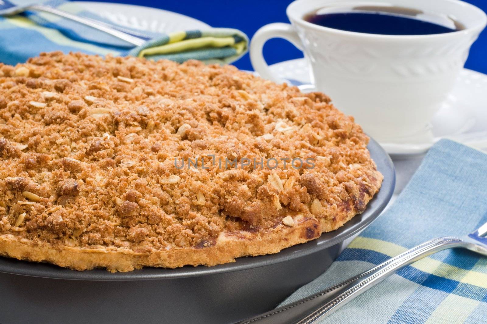 Delicious homemade apple pie served with coffee.