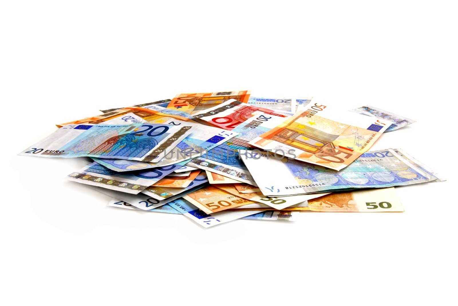 Pile of european currency bills isolated on white background