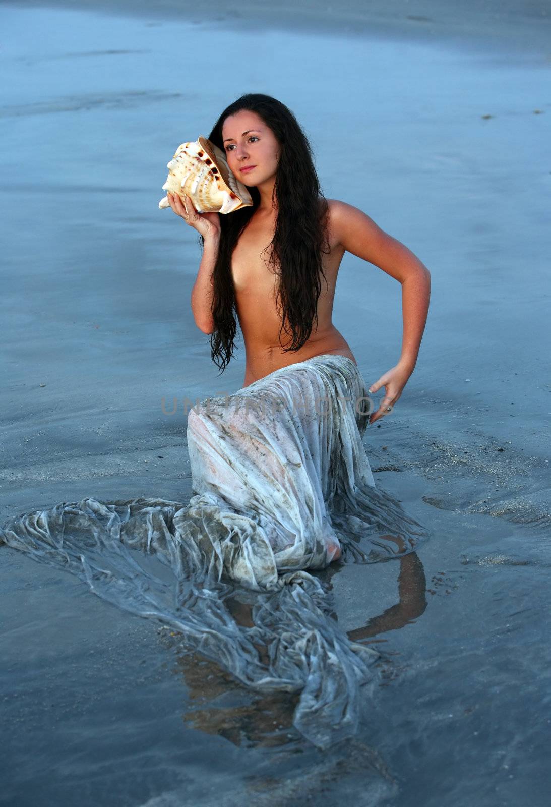 The beautiful girl in a role of the mermaid