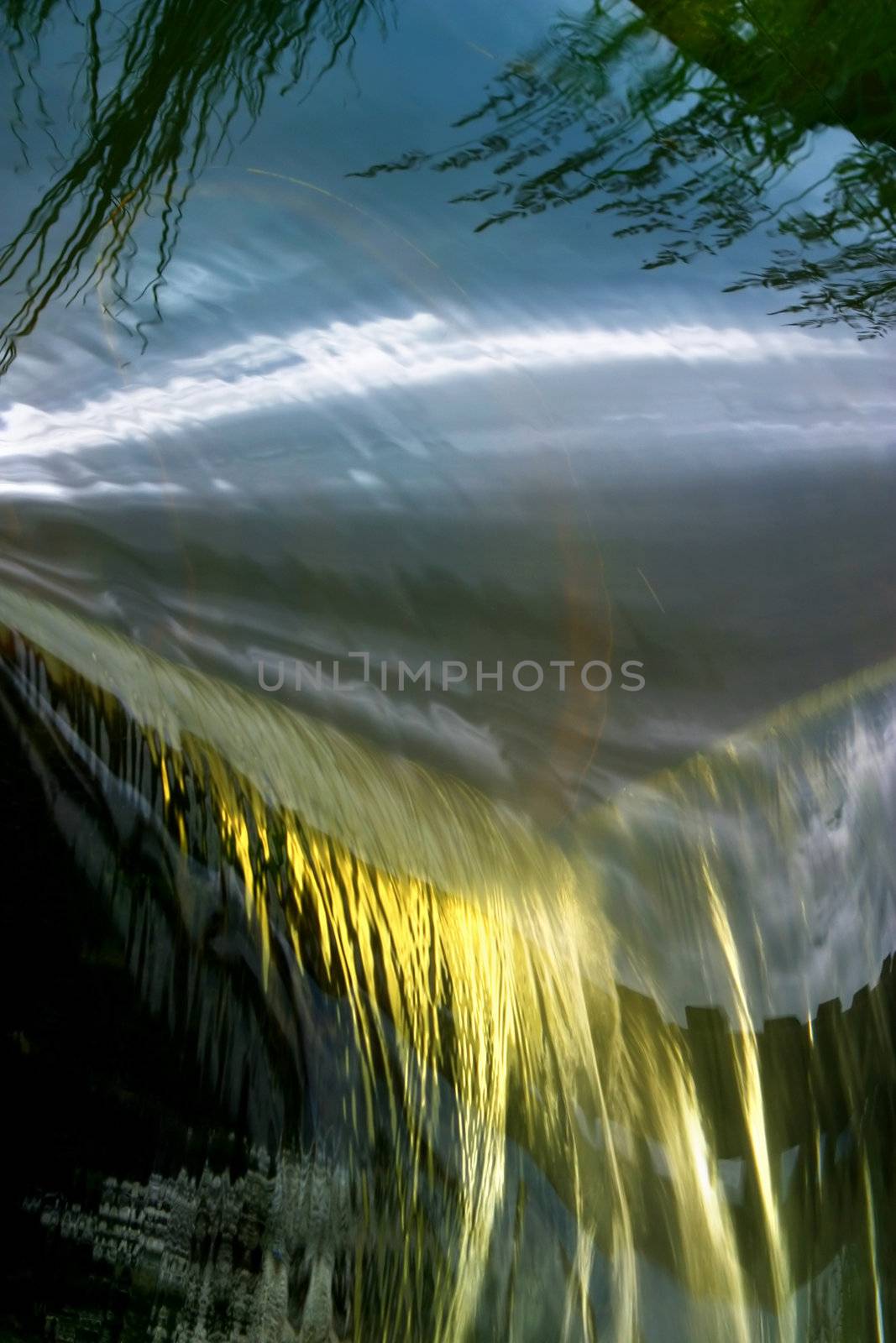 The image of a falls with reflection