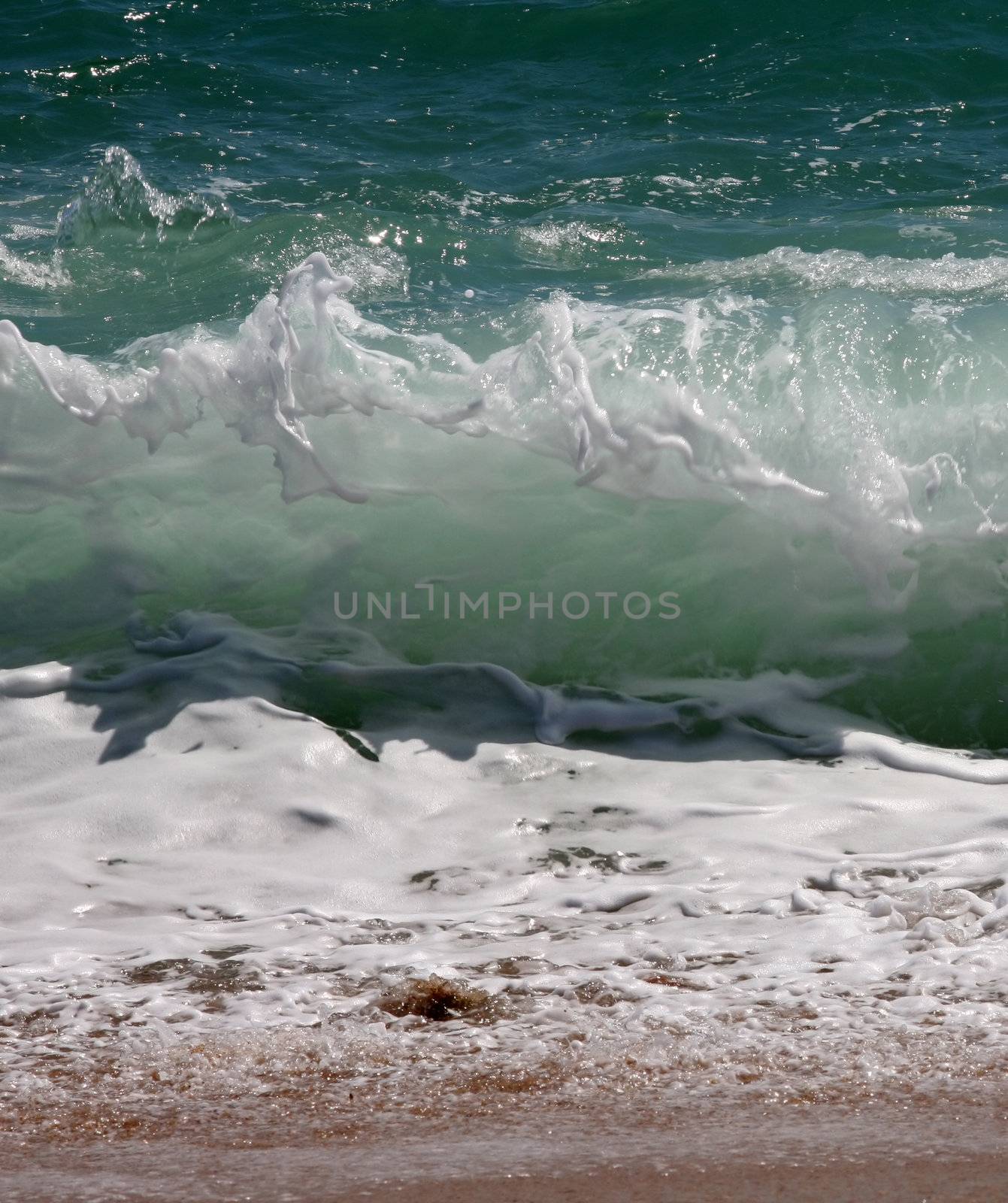 Big wave crashes on to the shore