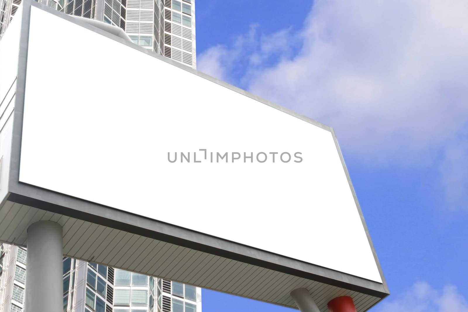 Blank Billboard with building concept for message advertisement and display