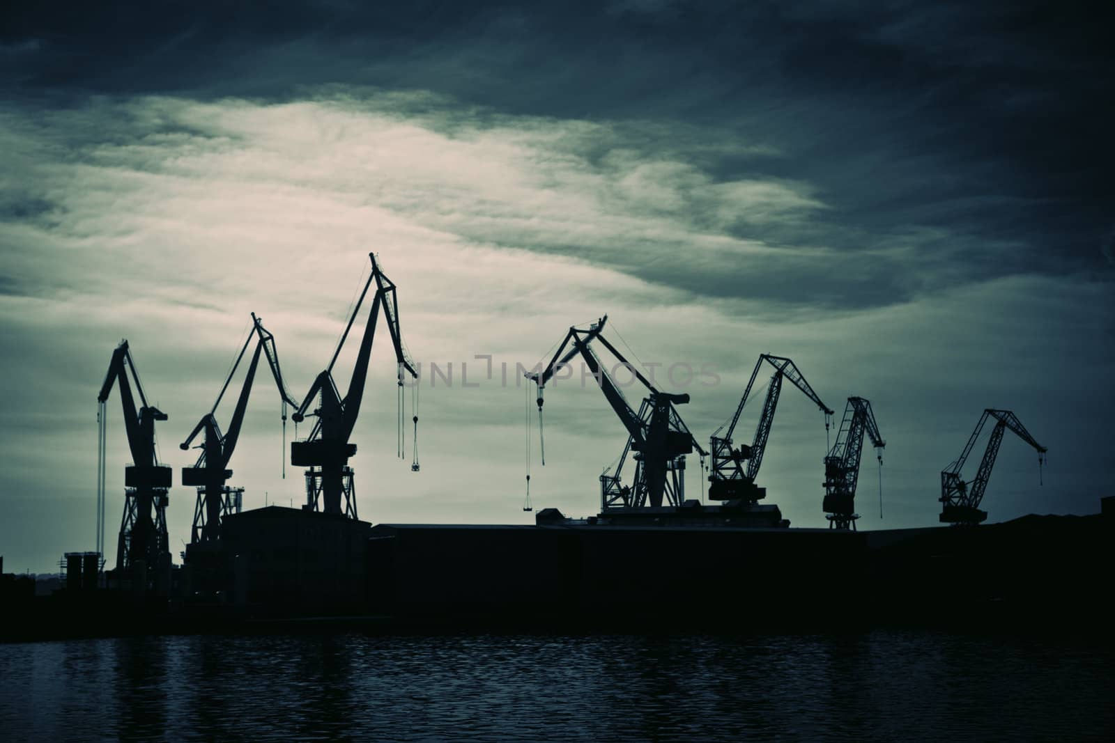 Shipyard cranes , retro style toned photo
