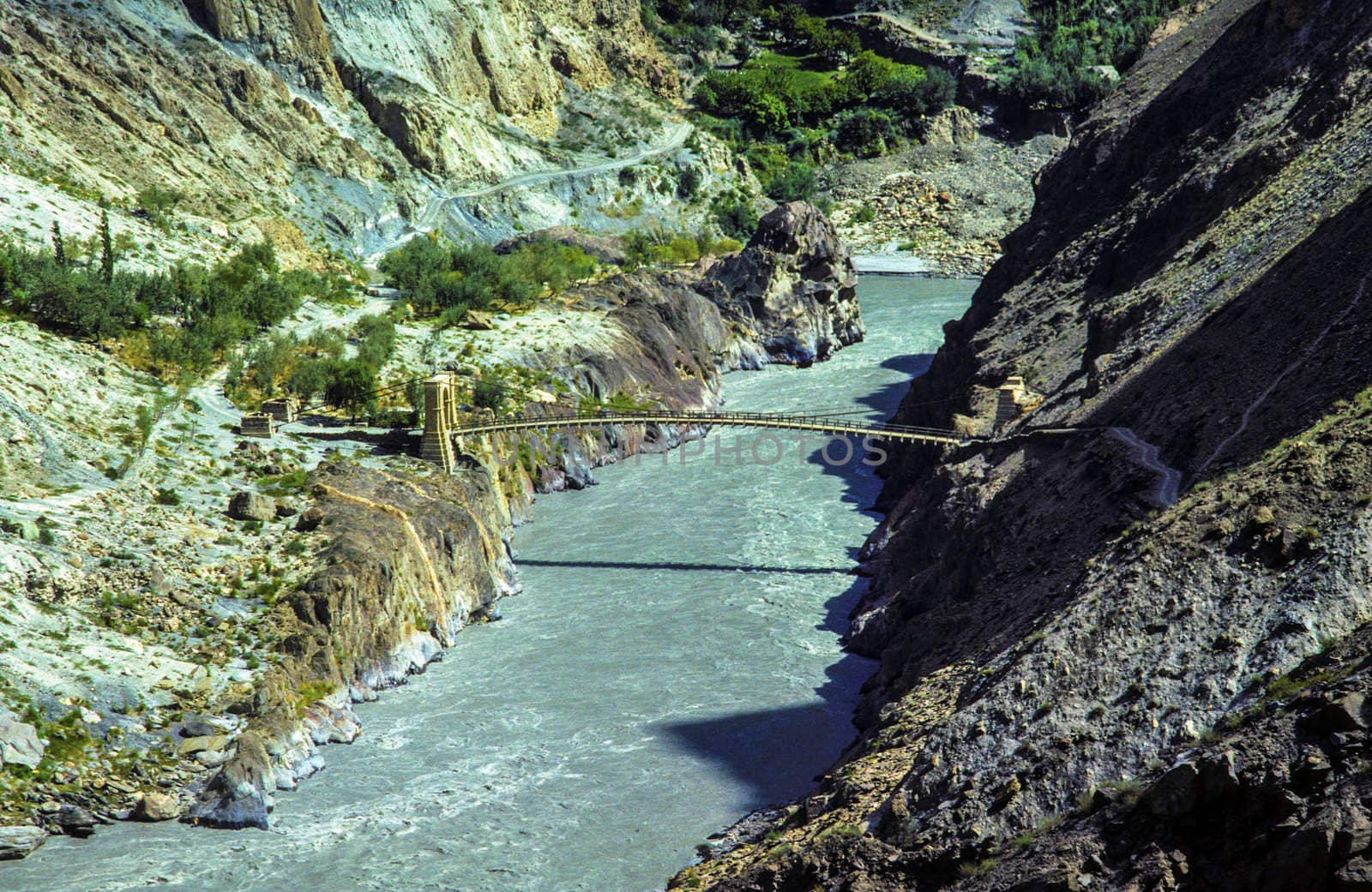 rope bridge over the Ganges river in Pakistan in the Karakorum a by meinzahn