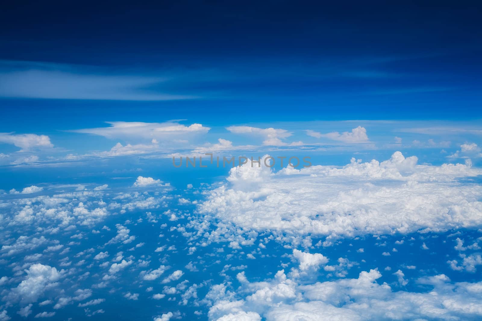 Beautiful white clouds and blue sky from above