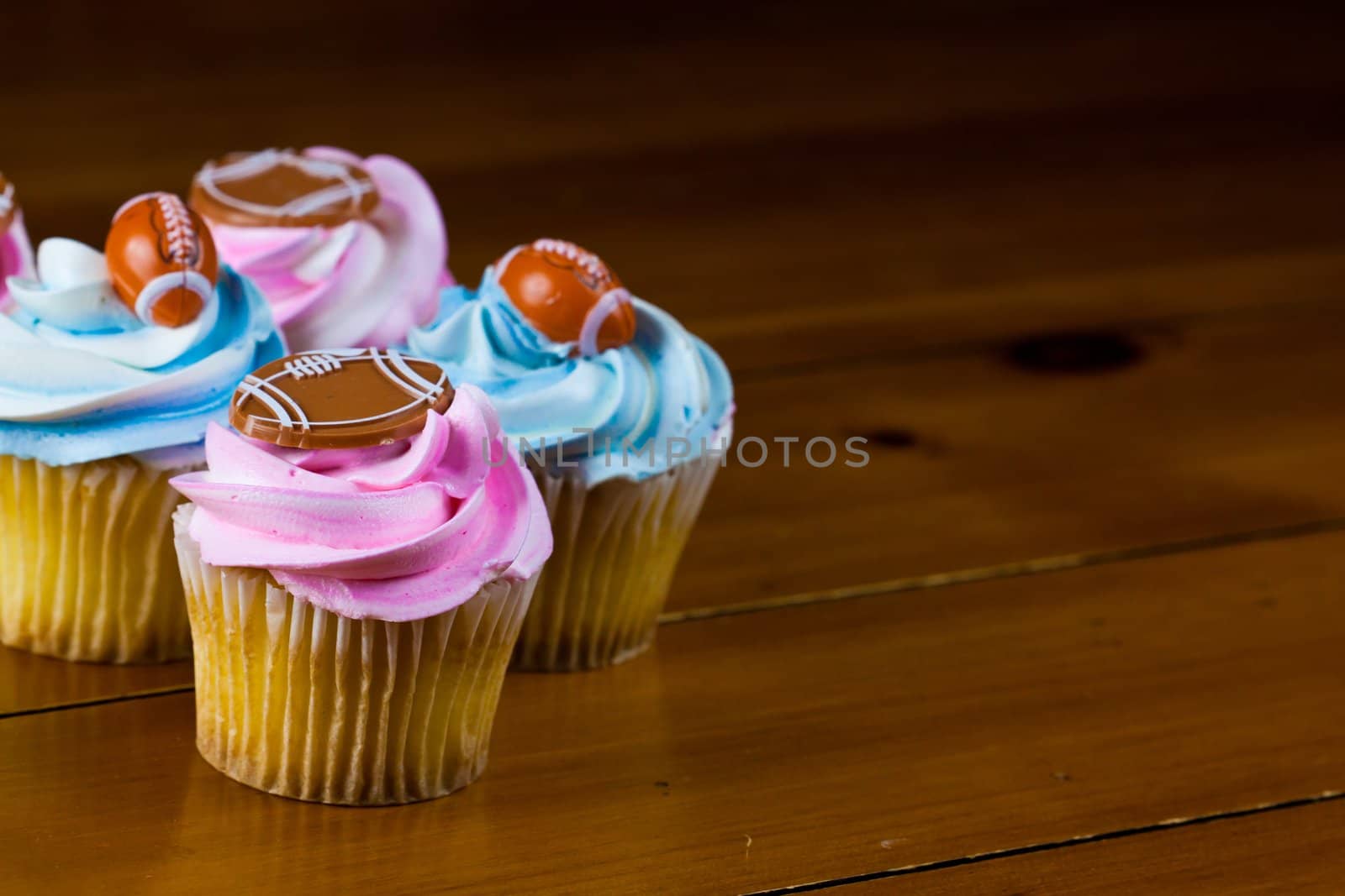 Close up of a cup cake on the wooden table