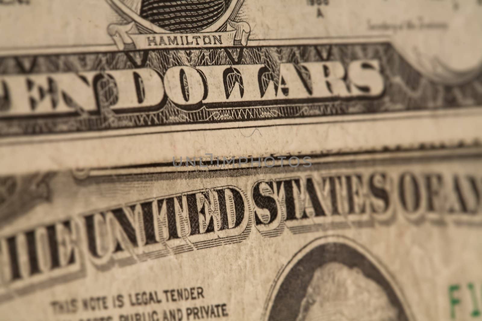 US dollars background, reto style toned photo with shallow DOF by Lizard