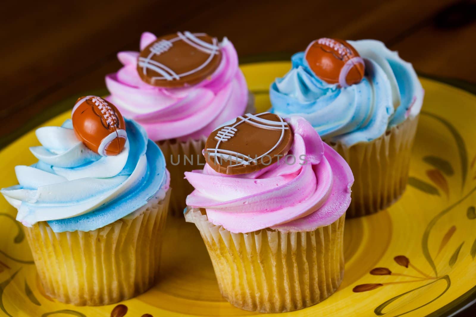 Close up of a cup cake on the wooden table