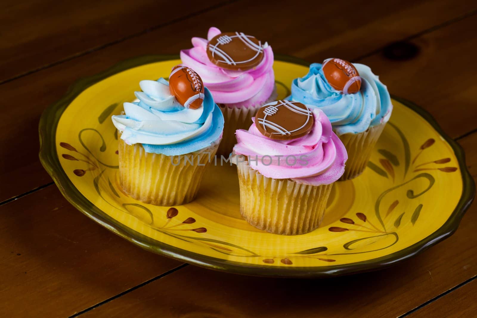 Close up of a cup cake on the wooden table