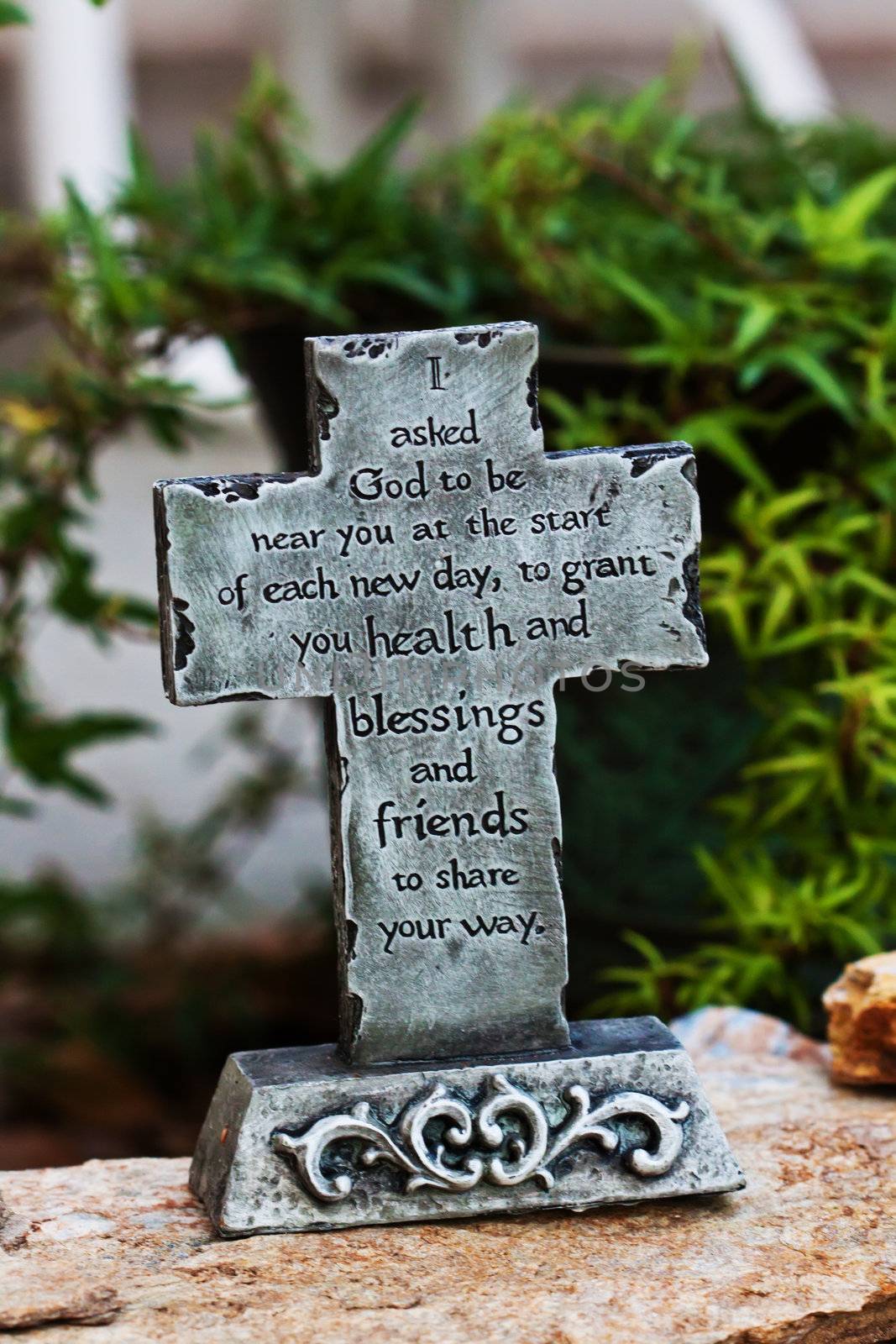 Close up decor of outdoors stone made cross