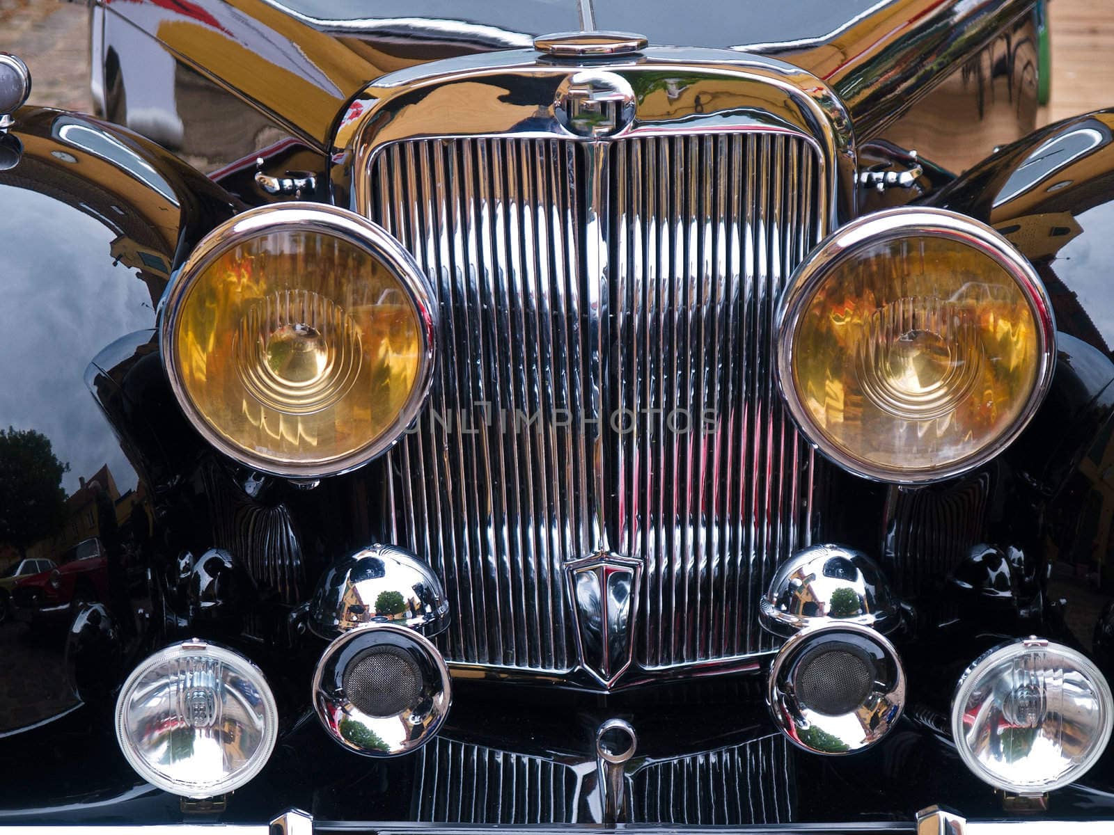 Details of a vintage classical American black sports car