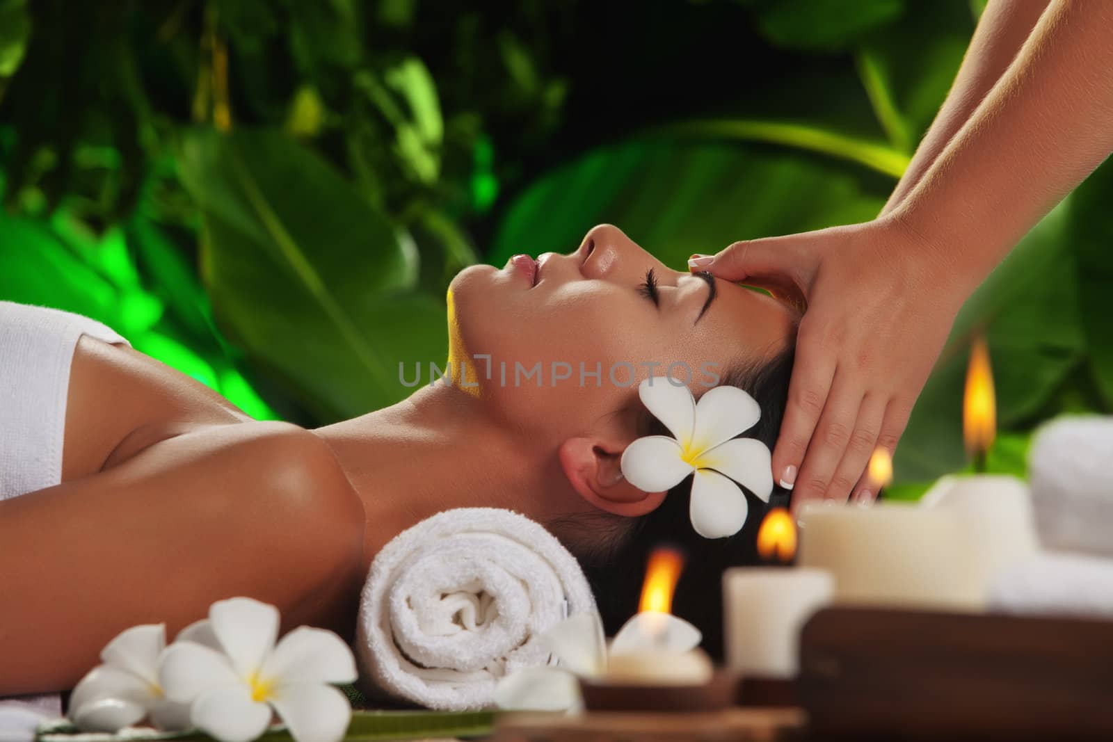 portrait of young beautiful woman in spa environment.