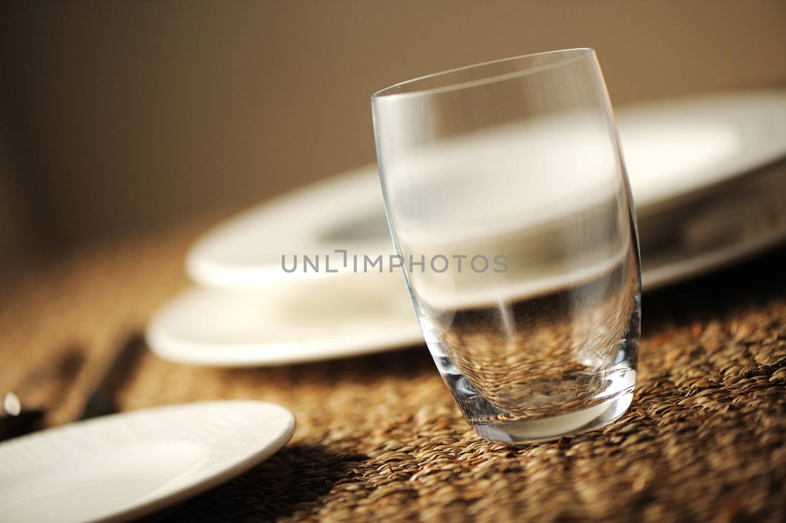 Elegant close up of a restaurant table, with a soft light